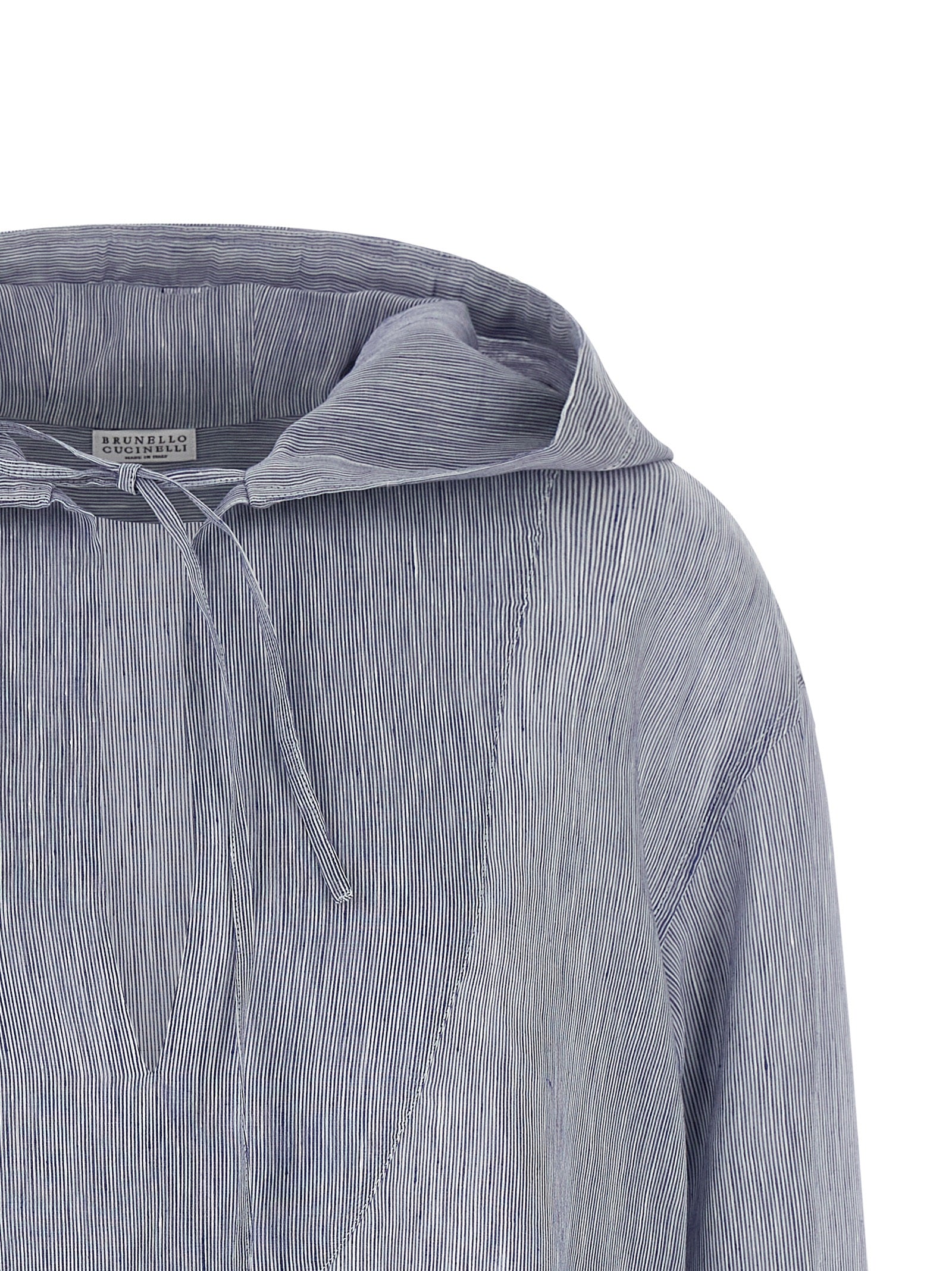 Elevate your wardrobe with the Brunello Cucinelli Blue Linen Blouse, a luxurious blend of linen and silk, embodying modern sophistication and timeless elegance.