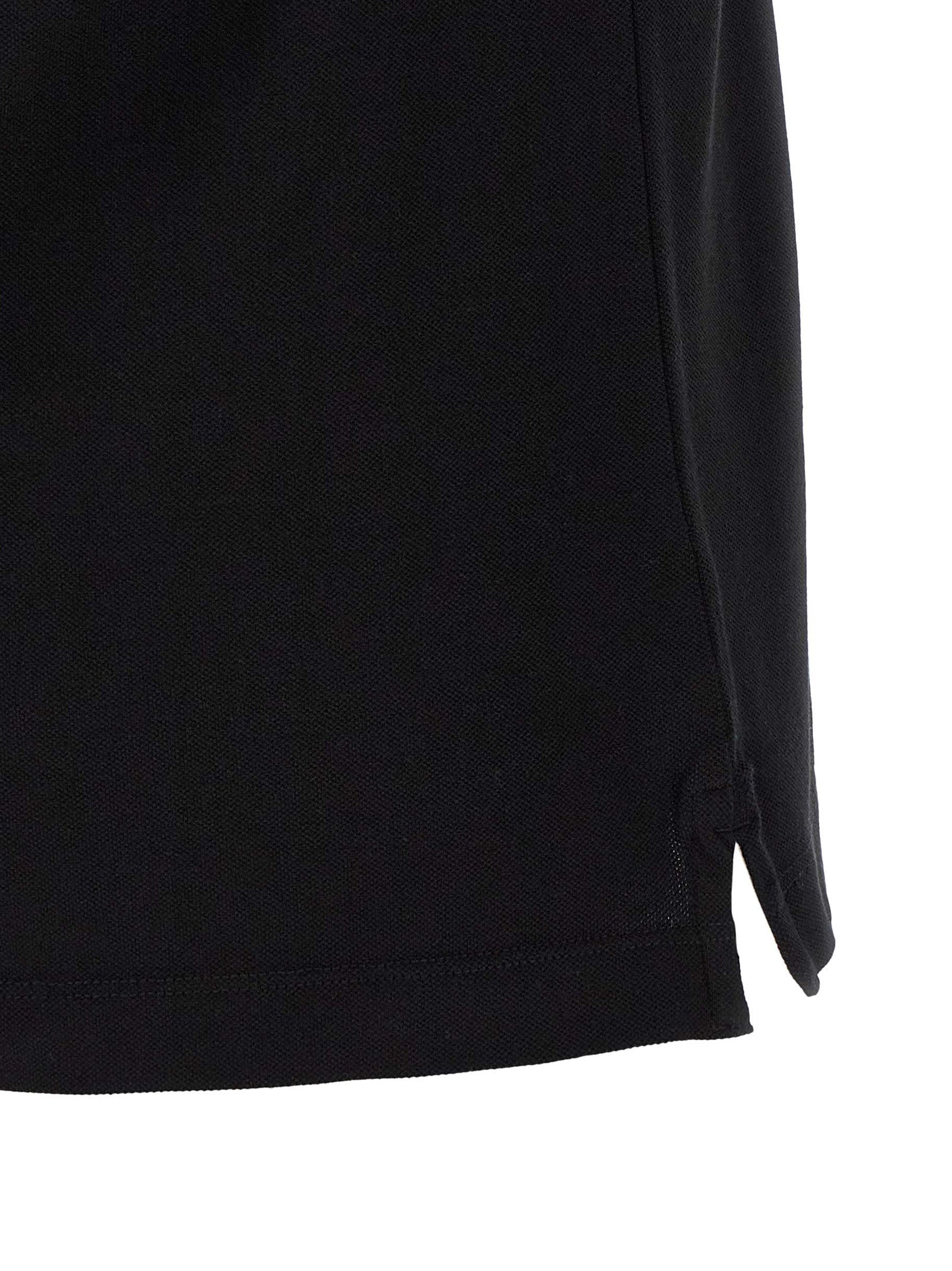 Indulge in the Stone Island Black Cotton Polo Shirt, a masterpiece of stretch cotton piqué that embodies timeless luxury and effortless sophistication for discerning individuals.