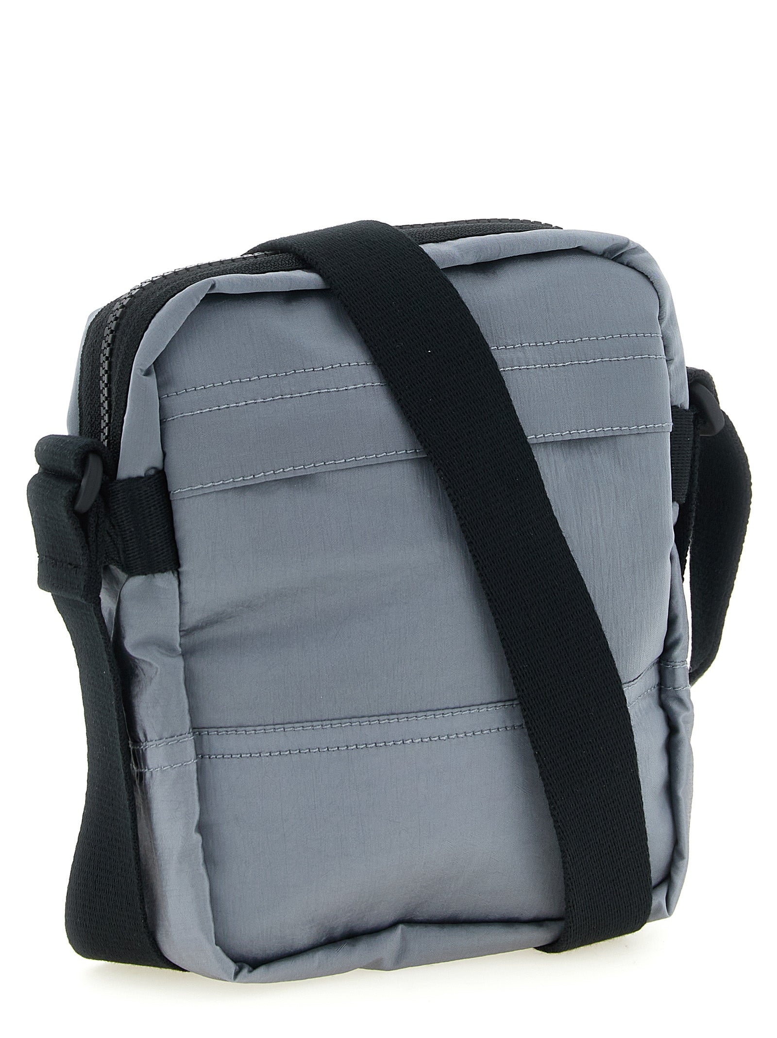 Discover the Stone Island Gray Polyamide Crossbody Bag, a fusion of eco-conscious luxury and urban elegance, crafted from iridescent Nylon Metal for the discerning individual.