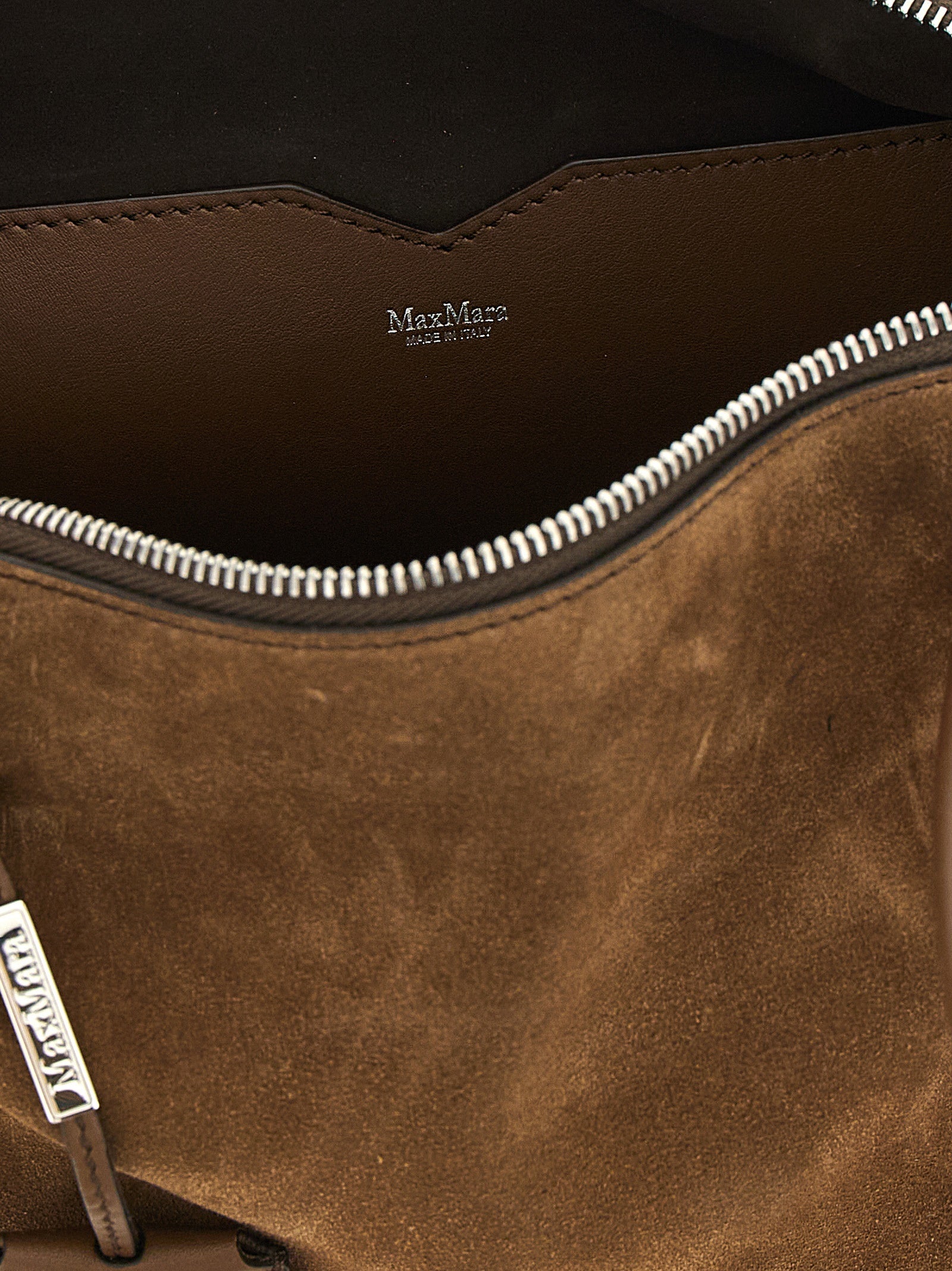 Discover the Max Mara Brown Calfskin Shoulder Bag, a luxurious testament to Italian craftsmanship, perfect for elevating your style with timeless elegance.