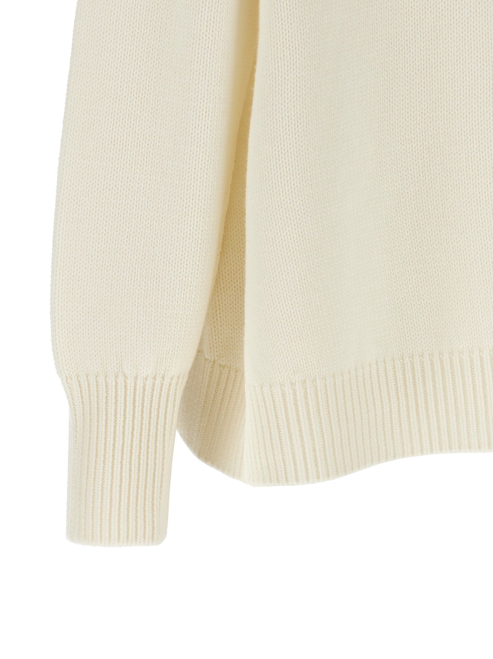 Experience the allure of the Fabiana Filippi White Virgin Wool Cardigan, a luxurious blend of elegance and comfort, crafted for timeless sophistication.