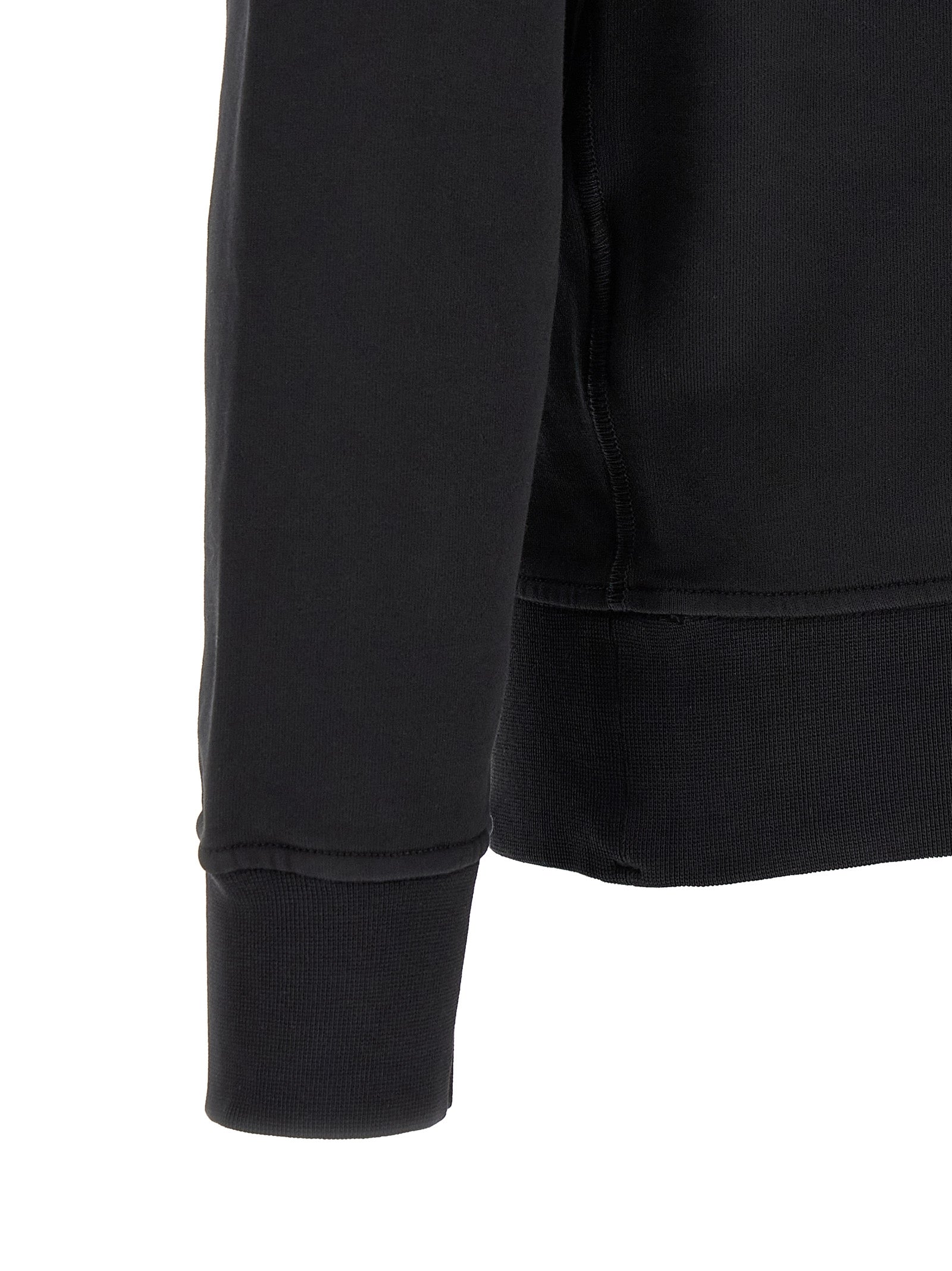 Indulge in the Stone Island Black Cotton Sweatshirt, a luxurious blend of sustainable organic cotton and refined craftsmanship, perfect for the discerning individual.
