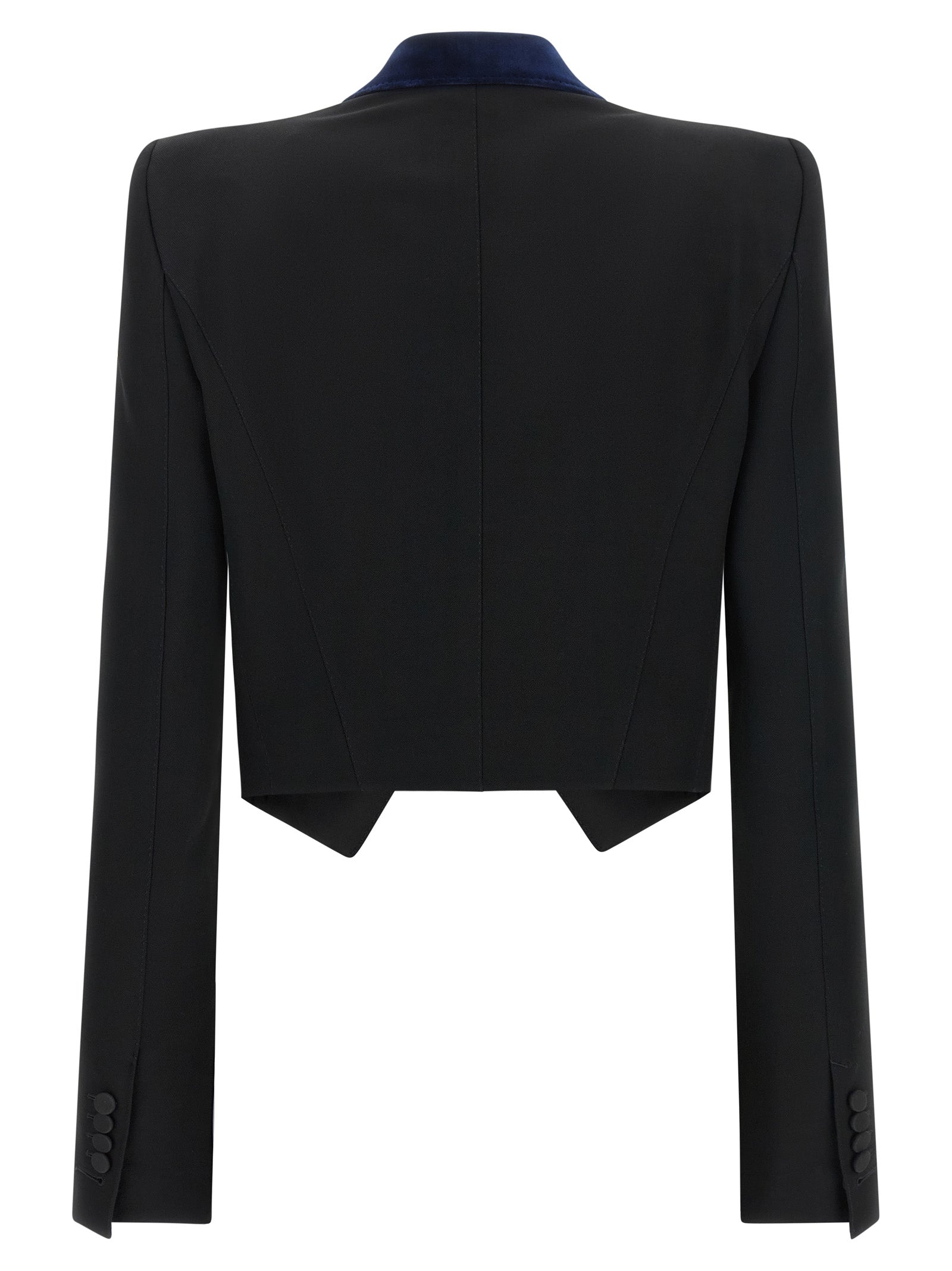 Experience the allure of the TOM FORD Black Wool Blazer, a masterpiece of Italian craftsmanship, blending luxurious materials with timeless elegance for the discerning individual.