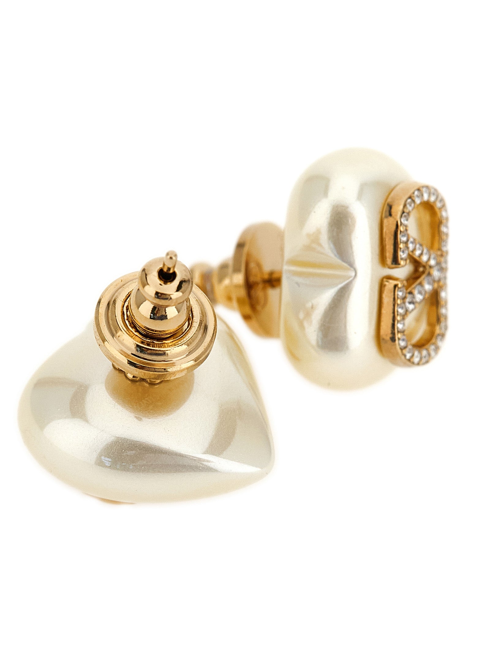 Elevate your elegance with Valentino Garavani Gold Brass Earrings, a masterpiece of Italian craftsmanship adorned with crystals, embodying timeless luxury and sophistication.
