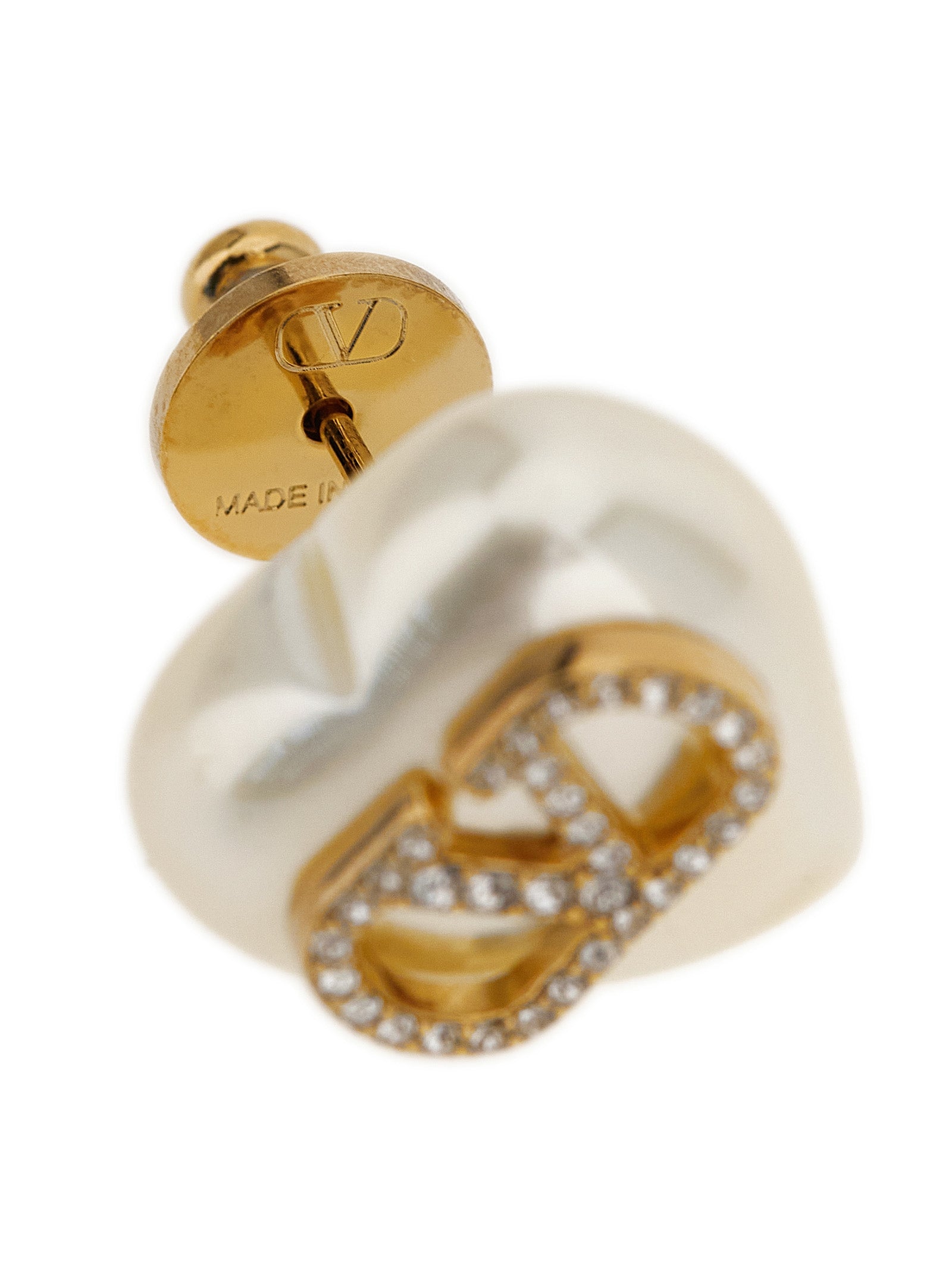 Discover the exquisite Valentino Garavani Gold Brass Earrings, a timeless blend of elegance and artistry, perfect for elevating your style with luxurious sophistication.