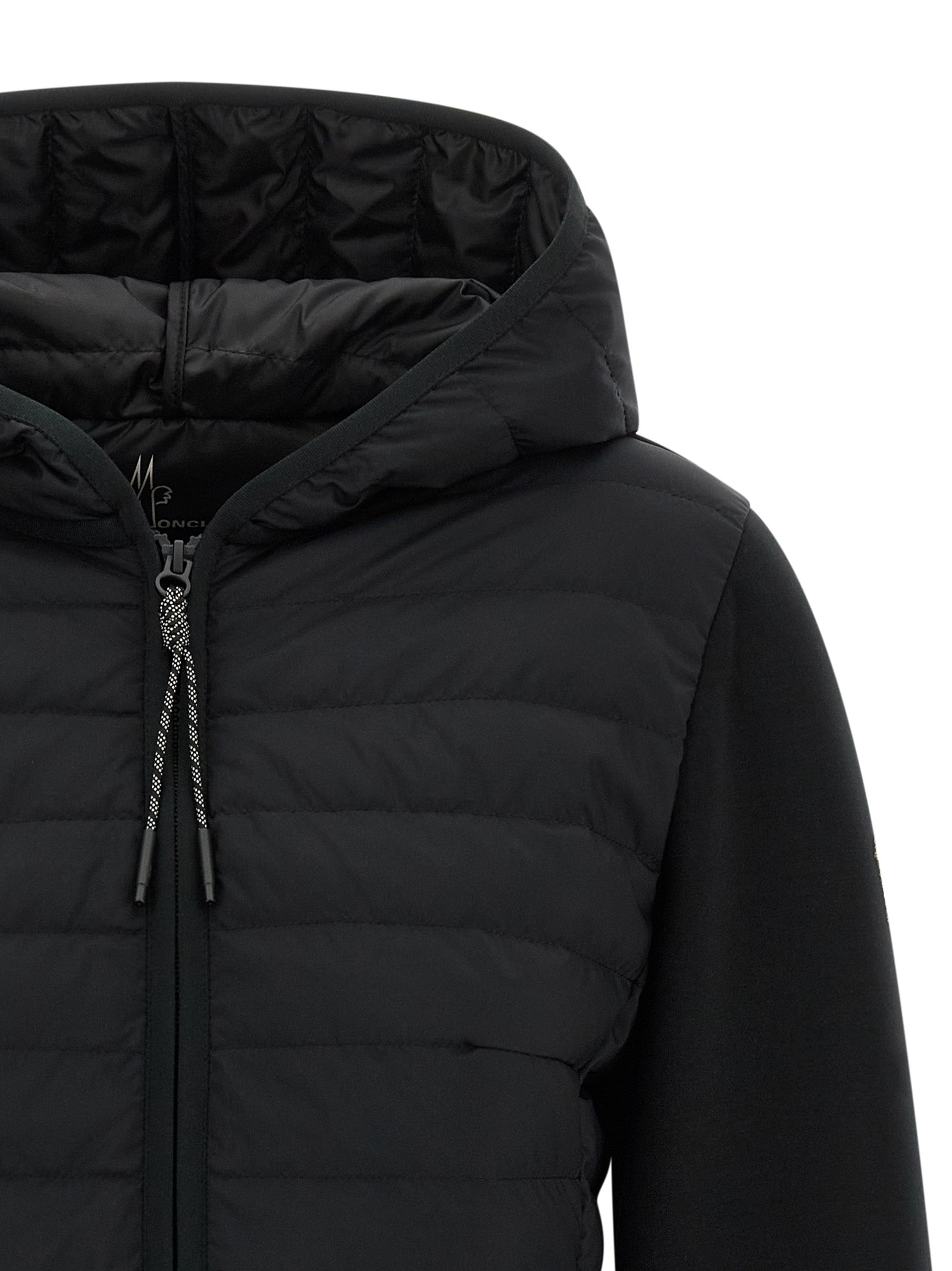 Elevate your style with the Moncler Grenoble Black Polyamide Full-Length Jacket, a luxurious blend of exquisite craftsmanship and timeless elegance, perfect for any occasion.