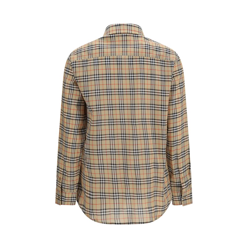 Elevate your style with the Burberry Beige Cotton Pattern Shirt, a masterpiece of timeless elegance and luxurious craftsmanship, perfect for any discerning wardrobe.