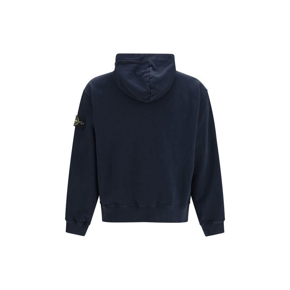 Experience the allure of the Stone Island Blue Cotton Sweatshirt, crafted from luxurious cotton for a refined silhouette that embodies modern sophistication and effortless style.