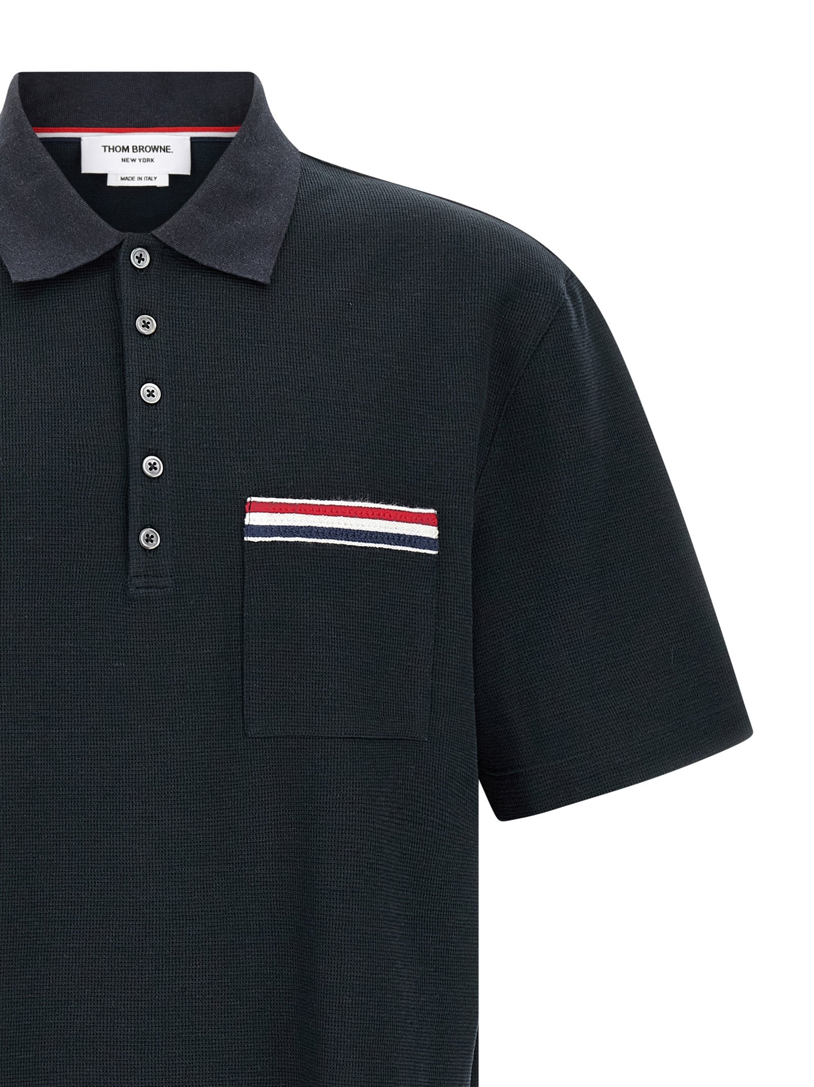 Elevate your style with the Thom Browne Blue Cotton Polo Shirt, a masterpiece of Italian craftsmanship, blending luxury and sophistication for the discerning individual.
