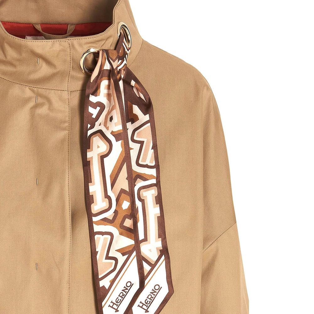 Indulge in the exquisite Herno Brown Cotton Coat, a masterpiece of Italian craftsmanship, blending timeless elegance with luxurious comfort for the discerning individual.