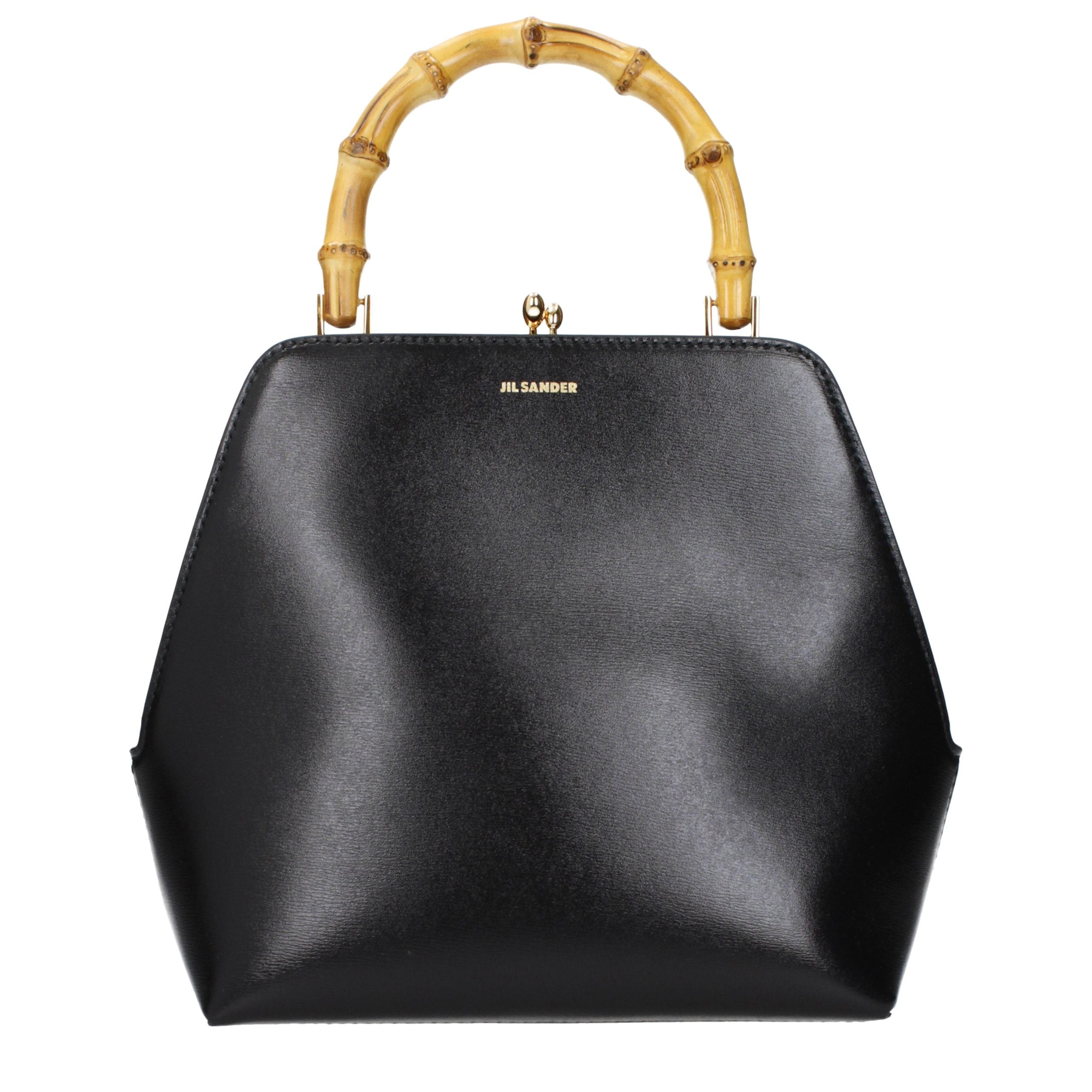 Indulge in the exquisite Jil Sander Black Leather Handbag, a timeless luxury accessory that embodies sophistication and elegance for the discerning individual.