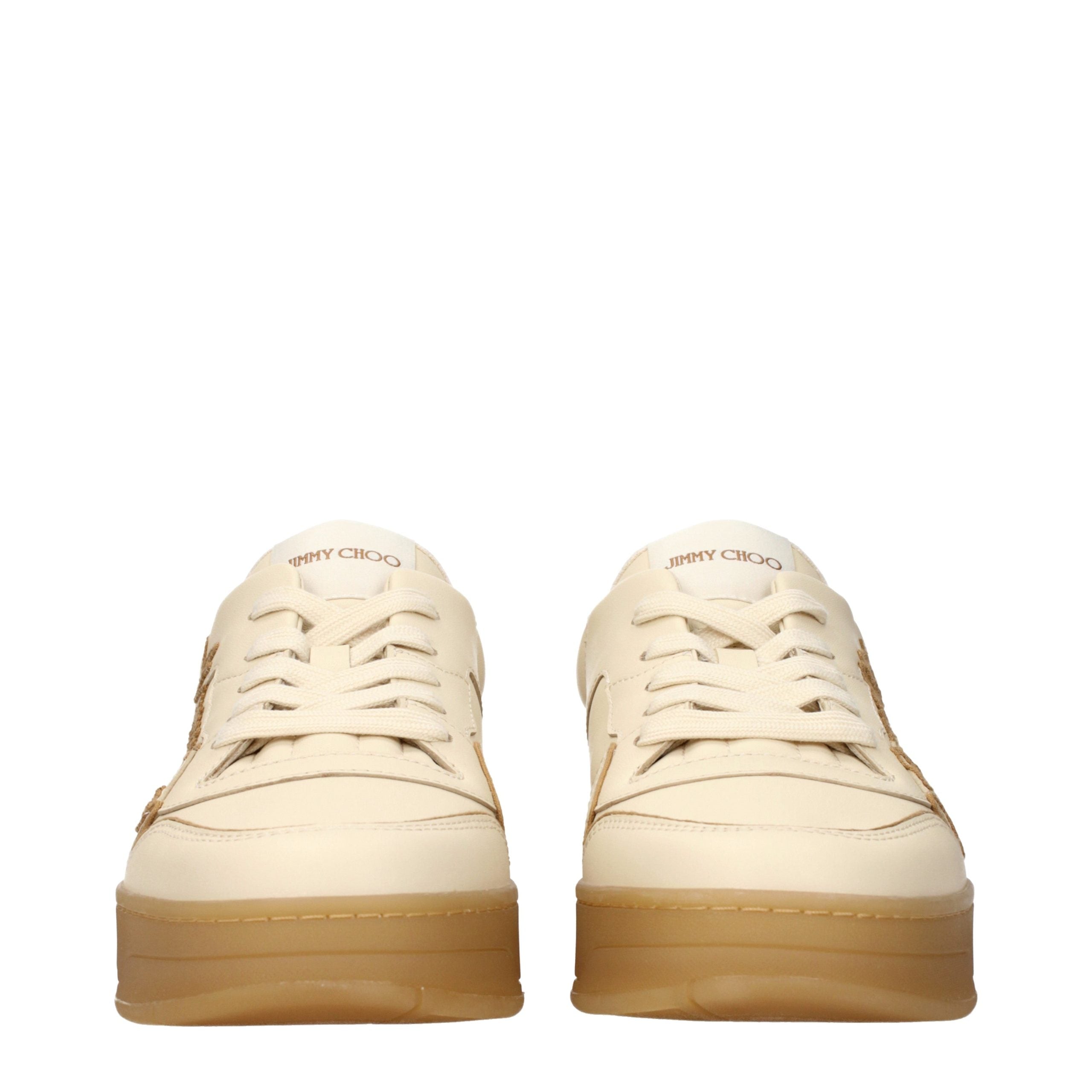 Indulge in the elegance of Jimmy Choo Beige Leather Low Top Sneakers, where exquisite craftsmanship meets timeless style, perfect for the discerning connoisseur.