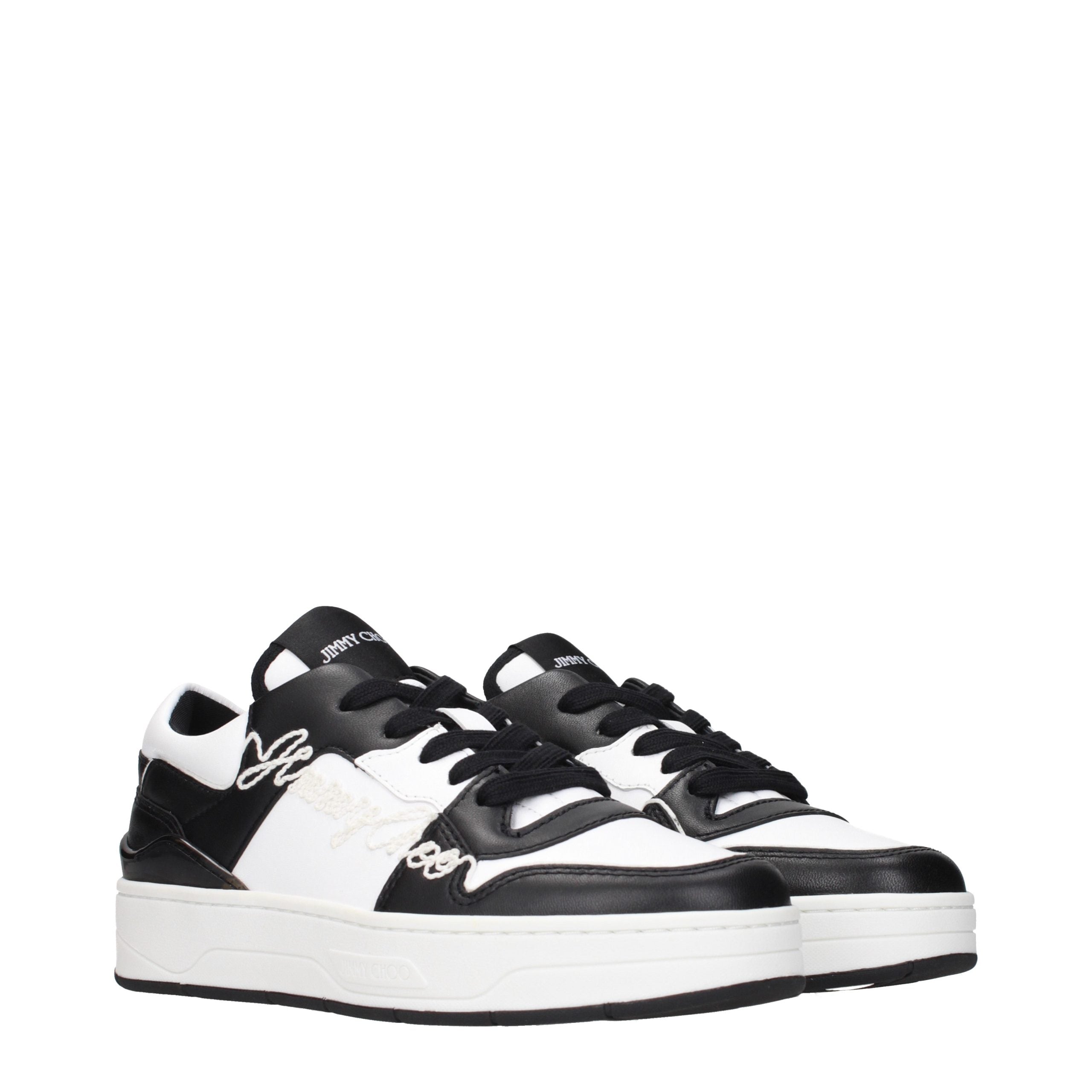 Indulge in the exquisite elegance of Jimmy Choo Black Leather Low Top Sneakers, where luxurious craftsmanship meets timeless sophistication for the discerning individual.