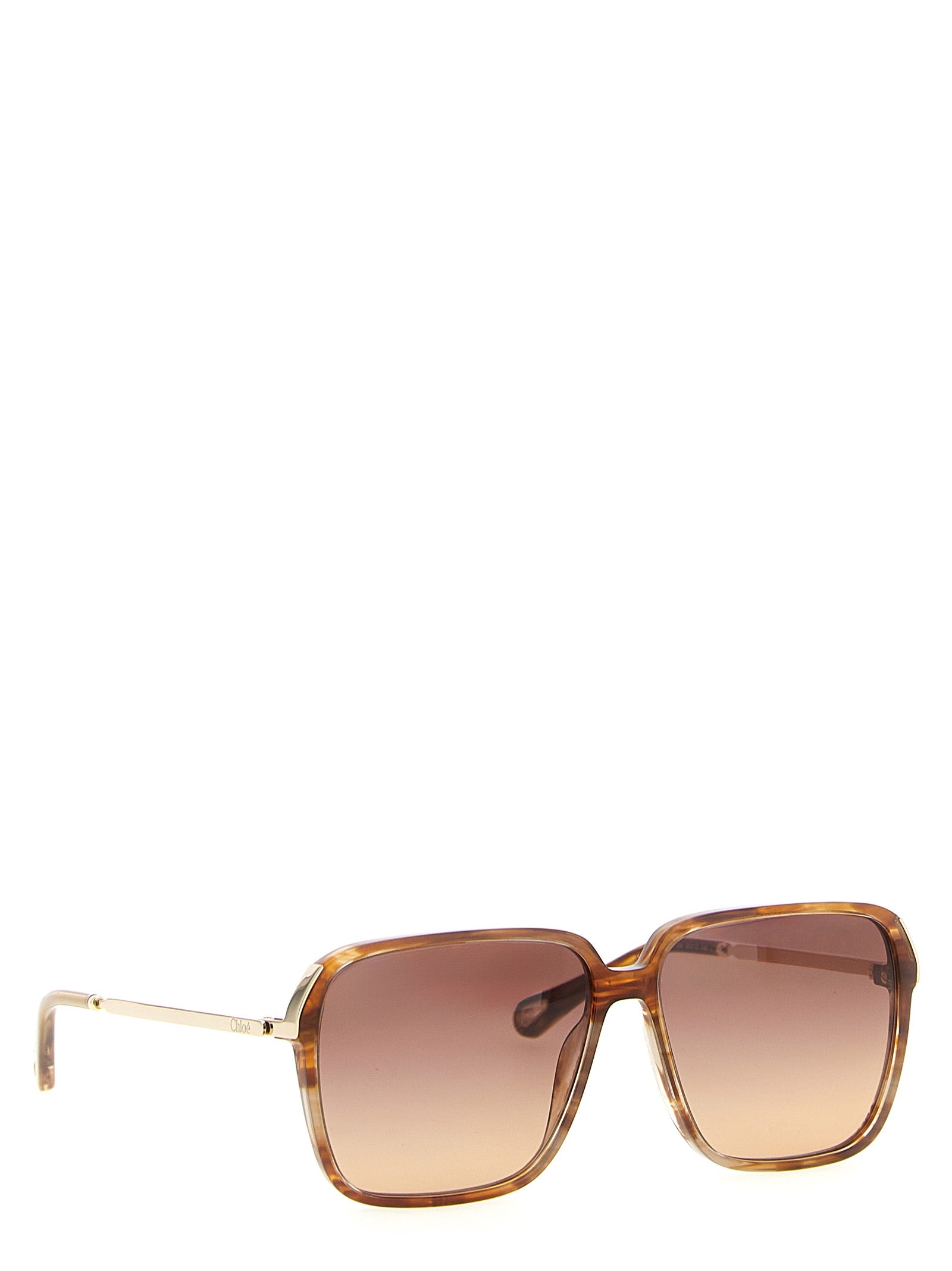 Indulge in the Chloé Brown Acetate Sunglasses, where luxurious tortoiseshell acetate meets exquisite craftsmanship, embodying timeless sophistication for the discerning individual.