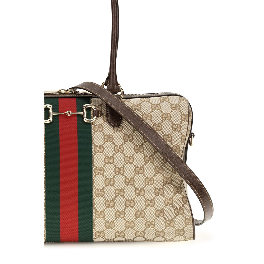 Discover the Gucci Beige Fabric Handbag, a timeless luxury piece crafted from iconic GG canvas, embodying sophistication and versatility for the discerning individual.
