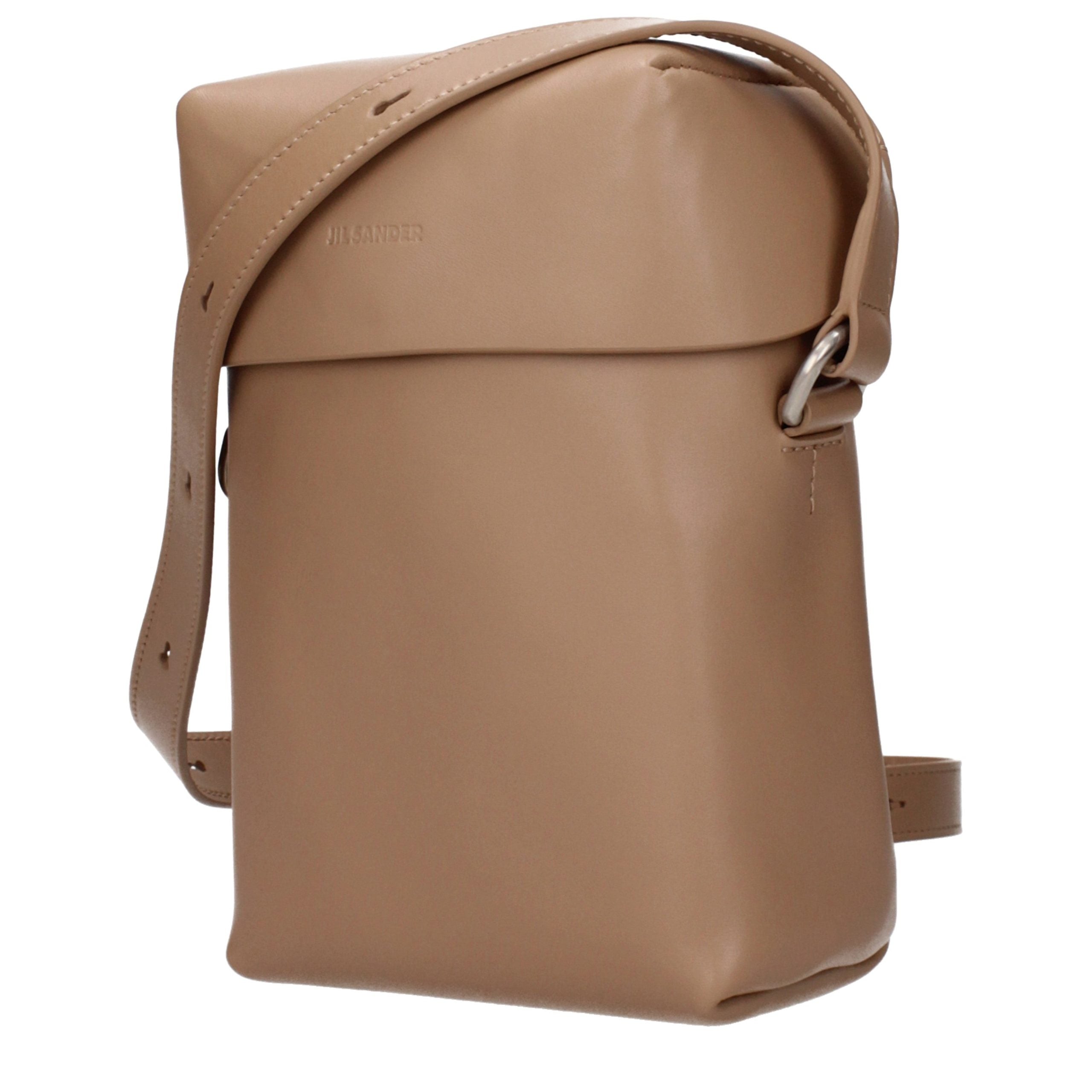 Discover the Jil Sander Brown Leather Crossbody Bag, a masterpiece of minimalist elegance and refined craftsmanship, perfect for those who embody sophistication and style.