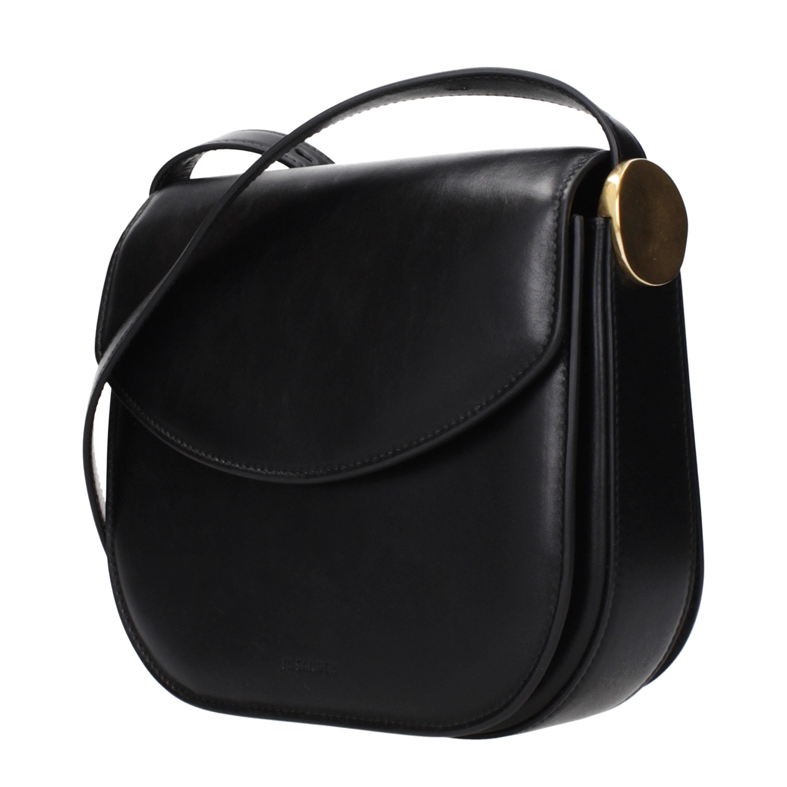 Discover the Jil Sander Black Leather Crossbody Bag, a masterpiece of artisanal craftsmanship and vintage allure, perfect for the discerning individual seeking timeless elegance.