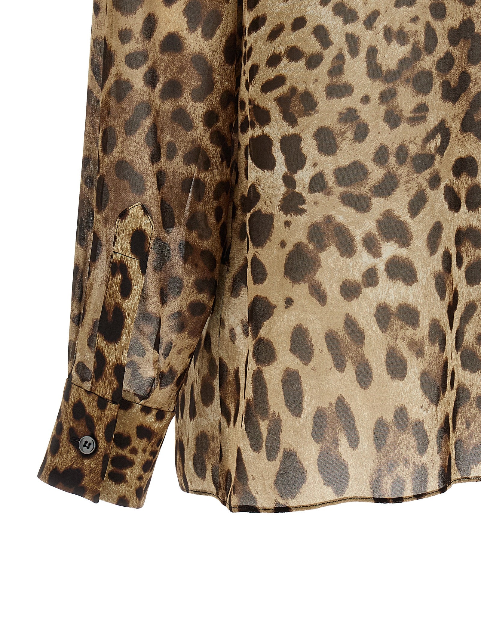Elevate your wardrobe with the Dolce & Gabbana Brown Silk Blouse, a luxurious silk georgette piece that embodies sophistication and allure for the discerning individual.