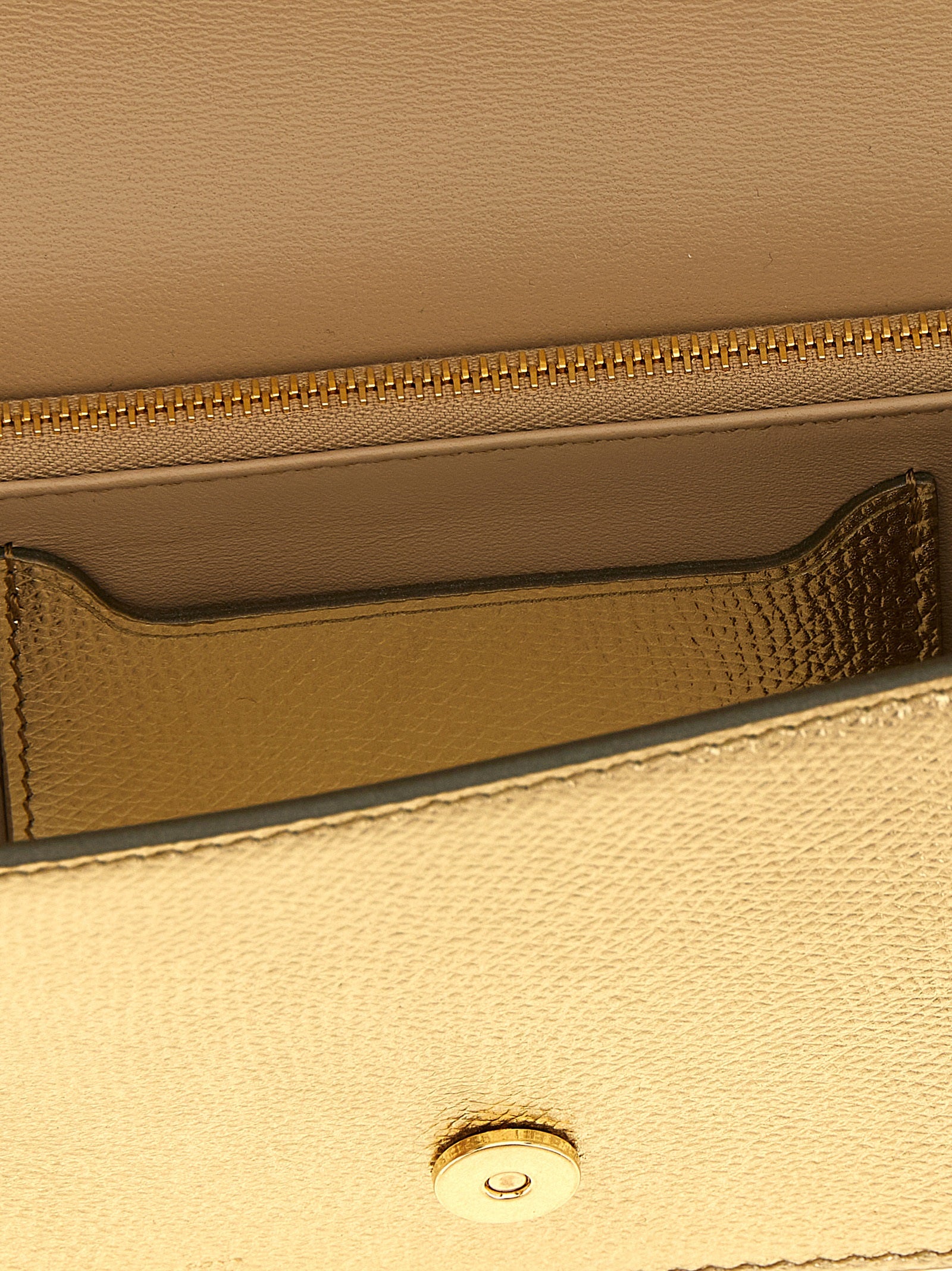 Valentino Garavani Gold Calfskin Crossbody Bag - Luxury Redefined