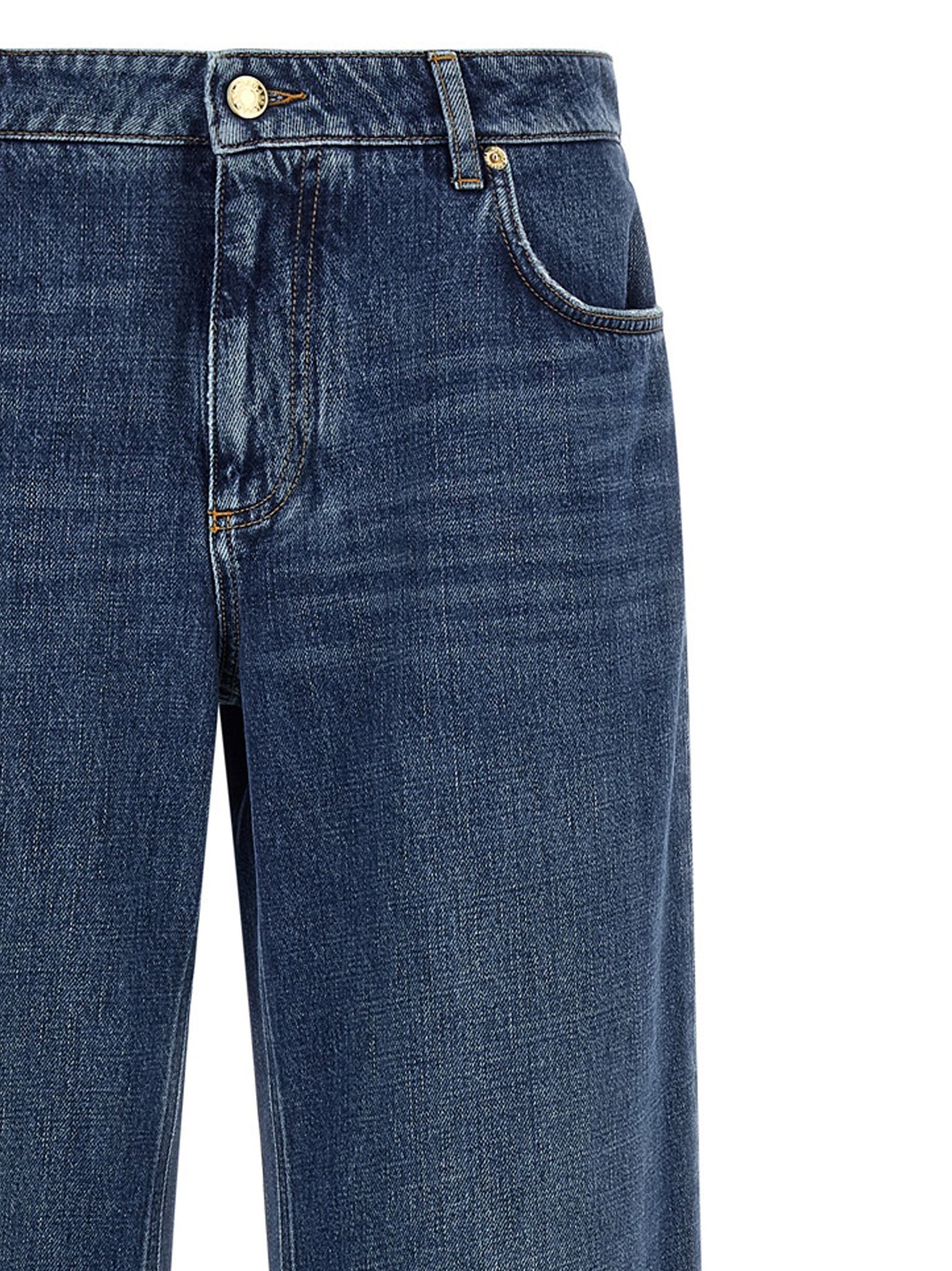 Elevate your wardrobe with Dolce & Gabbana's Blue Cotton Relaxed Fit Jeans, where exquisite Italian craftsmanship meets timeless elegance in a luxurious medium blue wash.