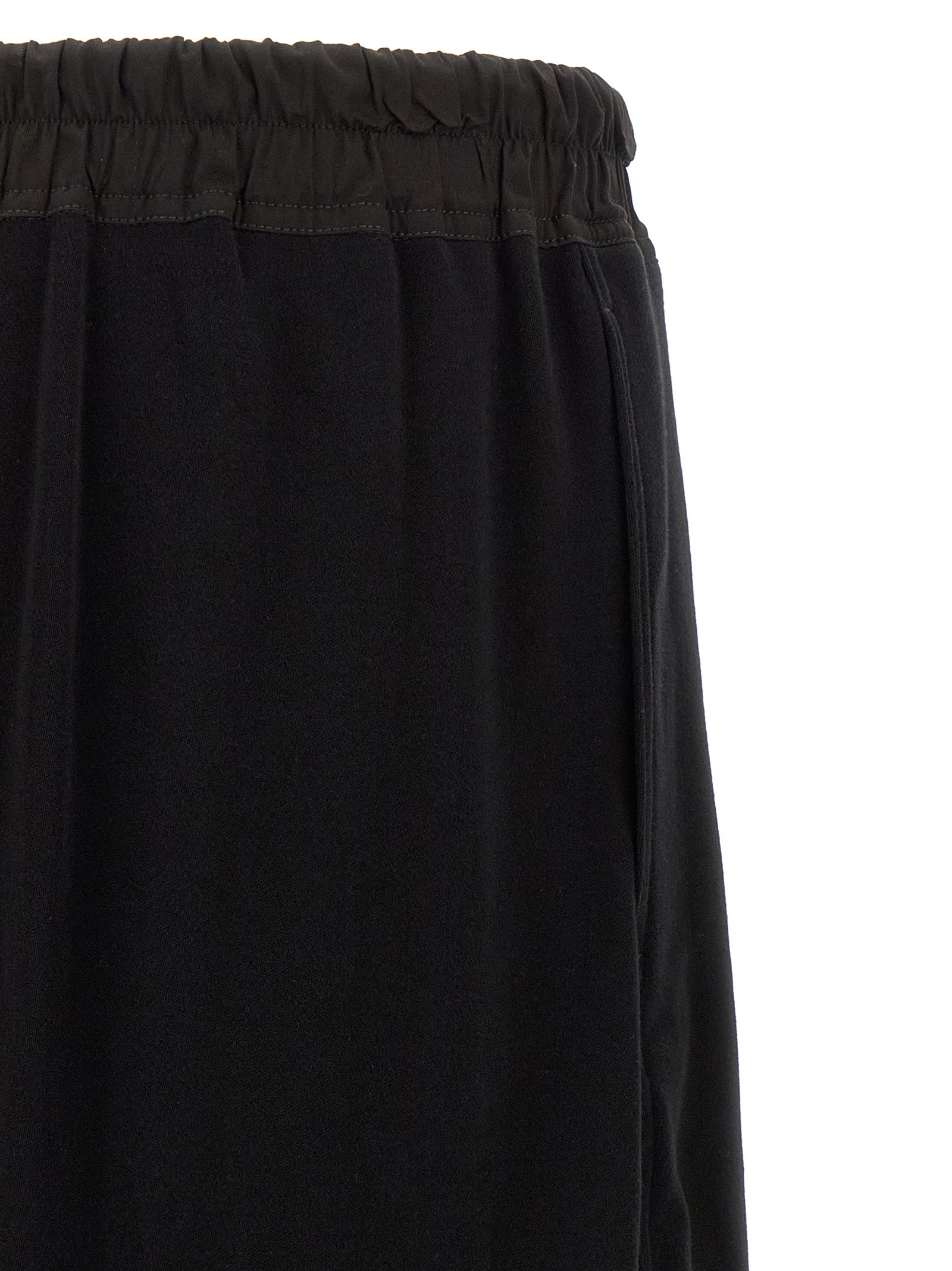 Experience the avant-garde allure of Rick Owens' Black Cotton Bermuda Shorts, crafted in Italy for those who embrace bold minimalism and refined elegance.
