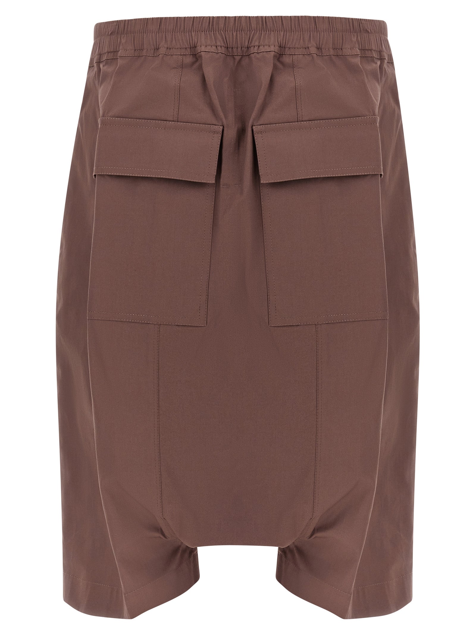 Elevate your wardrobe with Rick Owens’ Brown Cotton Bermuda Shorts, a sculptural masterpiece in avant-garde fashion, merging luxurious design with unparalleled craftsmanship.