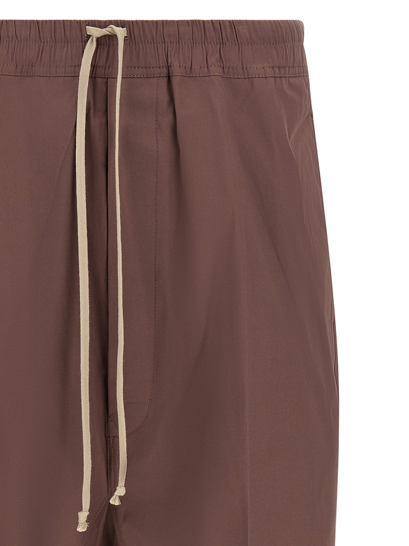 Elevate your style with Rick Owens Brown Cotton Bermuda Shorts, a sculptural masterpiece in avant-garde fashion, blending luxury and minimalism for the discerning trendsetter.