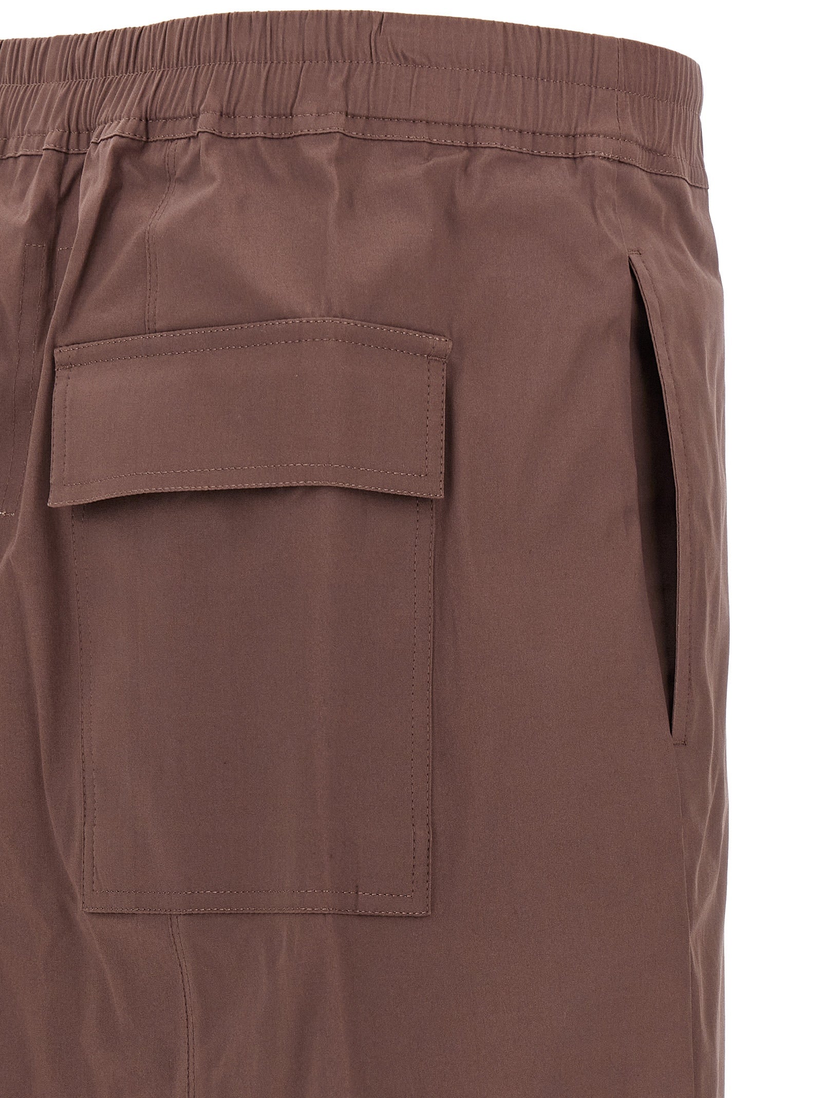 Elevate your wardrobe with Rick Owens' Brown Cotton Bermuda Shorts, a sculptural blend of avant-garde design and luxurious comfort, perfect for the discerning trendsetter.