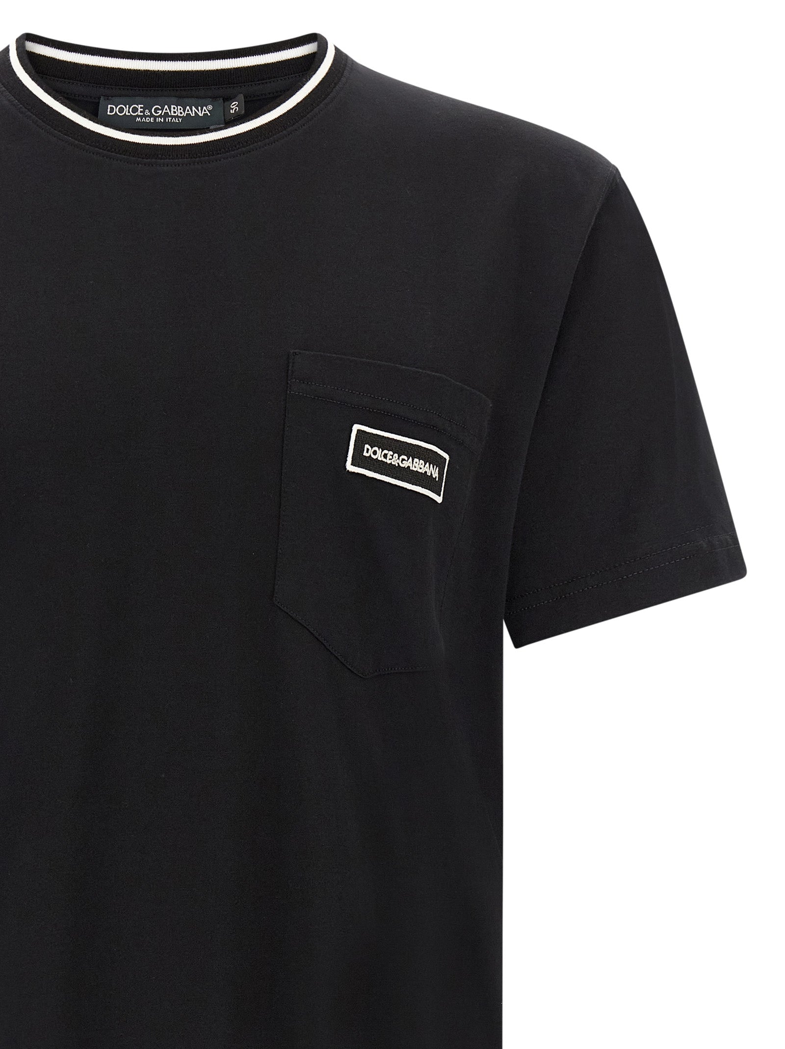 Indulge in the sophistication of the Dolce & Gabbana Black Cotton T-Shirt, a timeless piece crafted from pure cotton, embodying elegance and refined style for the discerning individual.