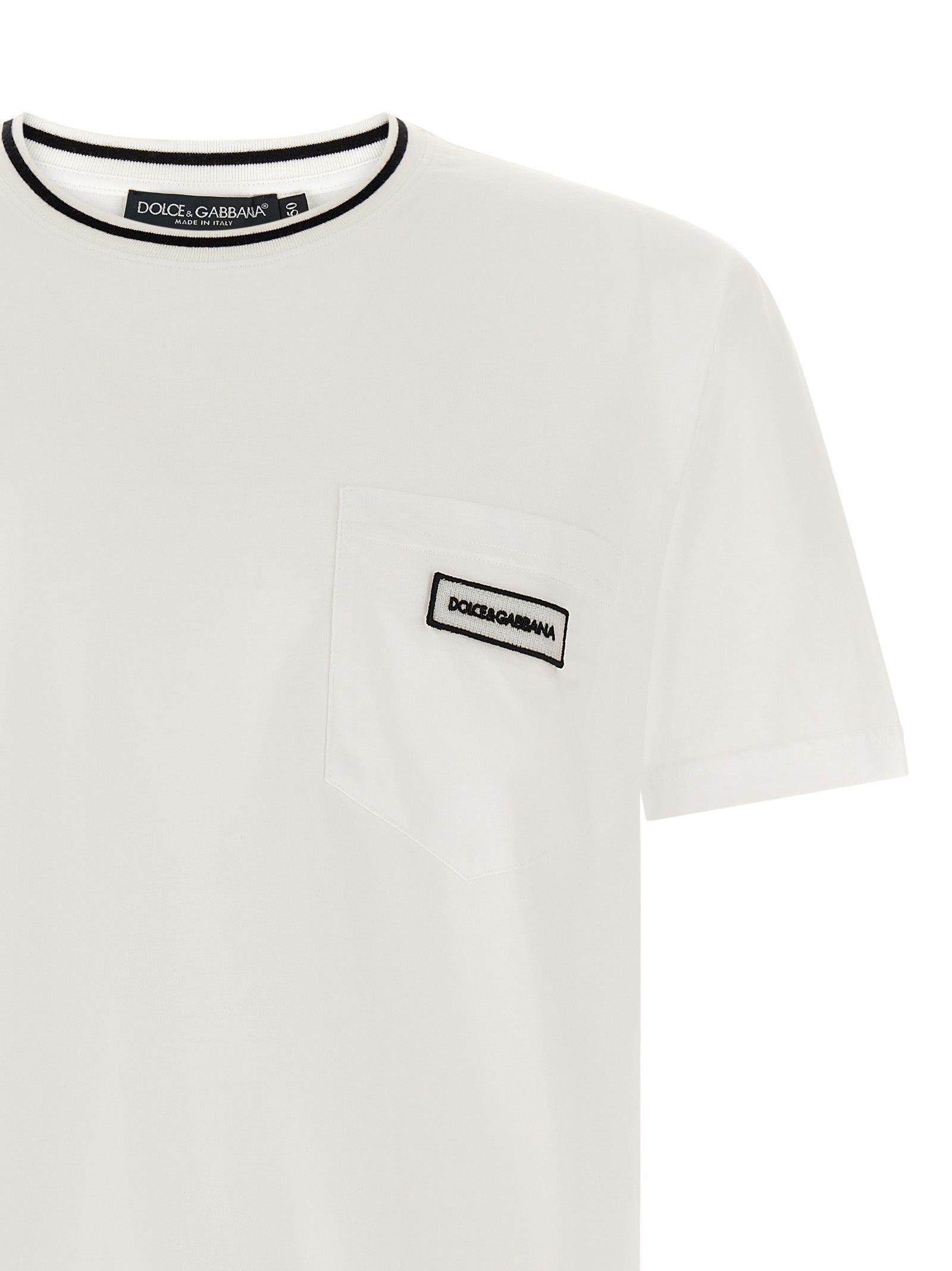 Discover the timeless elegance of the Dolce & Gabbana White Cotton T-Shirt, crafted in Italy from luxurious cotton, embodying minimalist sophistication for the discerning wardrobe.