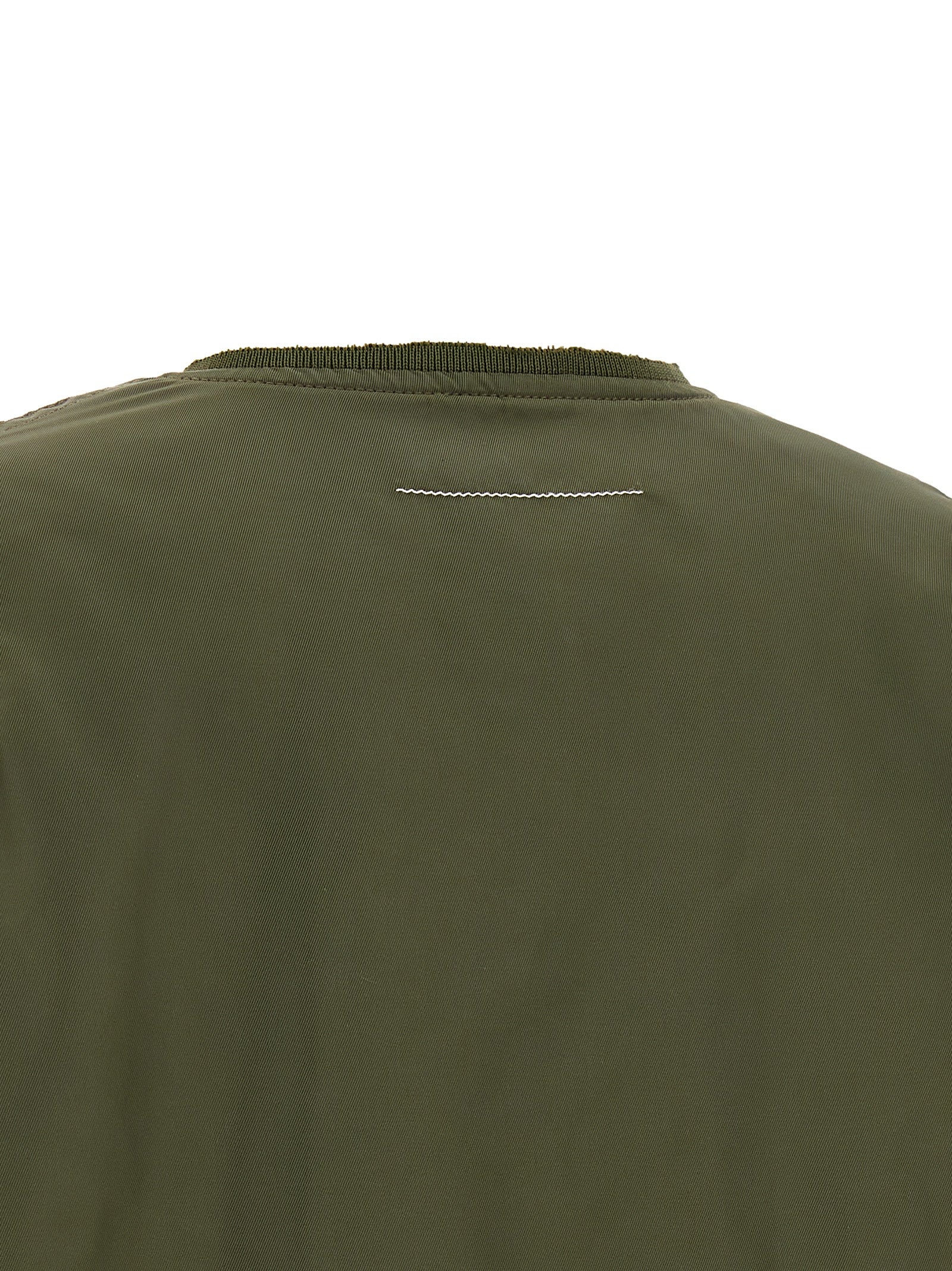Discover the MM6 Maison Margiela Bicolor Polyamide Bomber, a masterpiece of modern elegance, crafted in Italy for those who embrace bold sophistication and unique style.