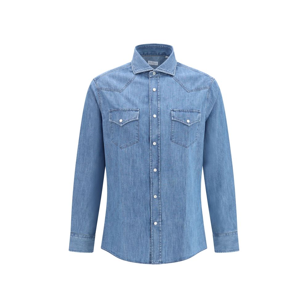 Indulge in the effortless elegance of the Brunello Cucinelli Blue Denim Shirt, crafted from 100% cotton for a luxurious fit that transcends seasons.