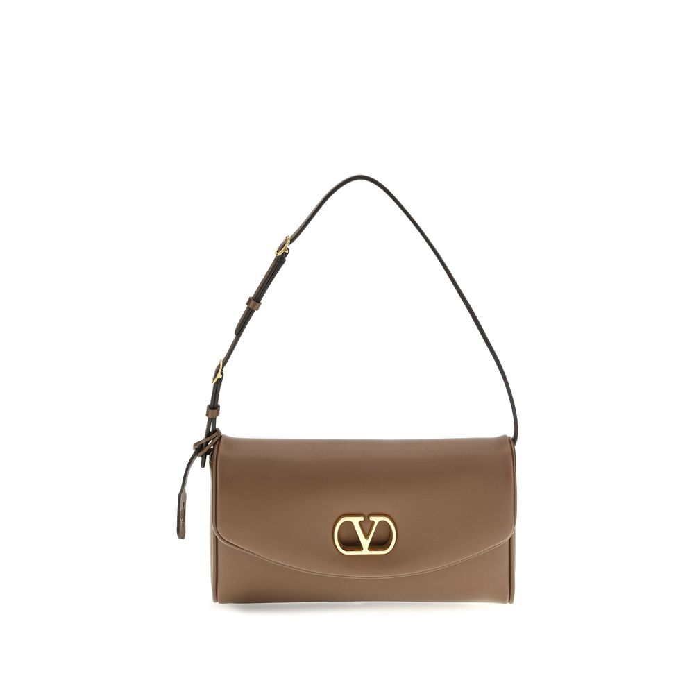 Discover the Valentino Garavani Brown Calf Leather Bos Taurus Shoulder Bag, a masterpiece of nappa leather and iconic design, elevating your style with timeless elegance.