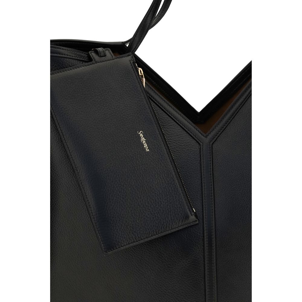 Indulge in the elegance of the Saint Laurent Black Calf Leather Bos Taurus Shoulder Bag, a timeless accessory that embodies refined craftsmanship and luxurious sophistication.