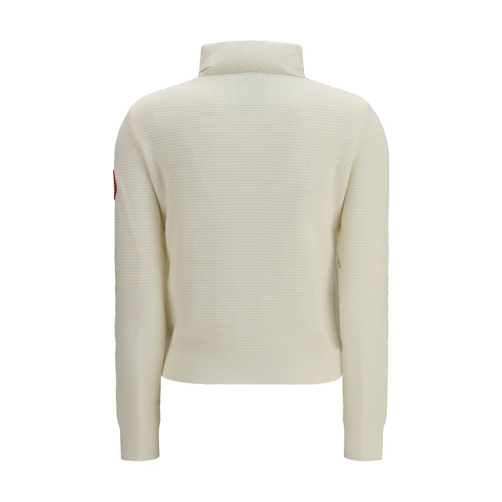 Indulge in the Canada Goose Beige Wool Oves Aries Full-Length Jacket, where exquisite wool craftsmanship meets modern elegance, perfect for those who command presence.