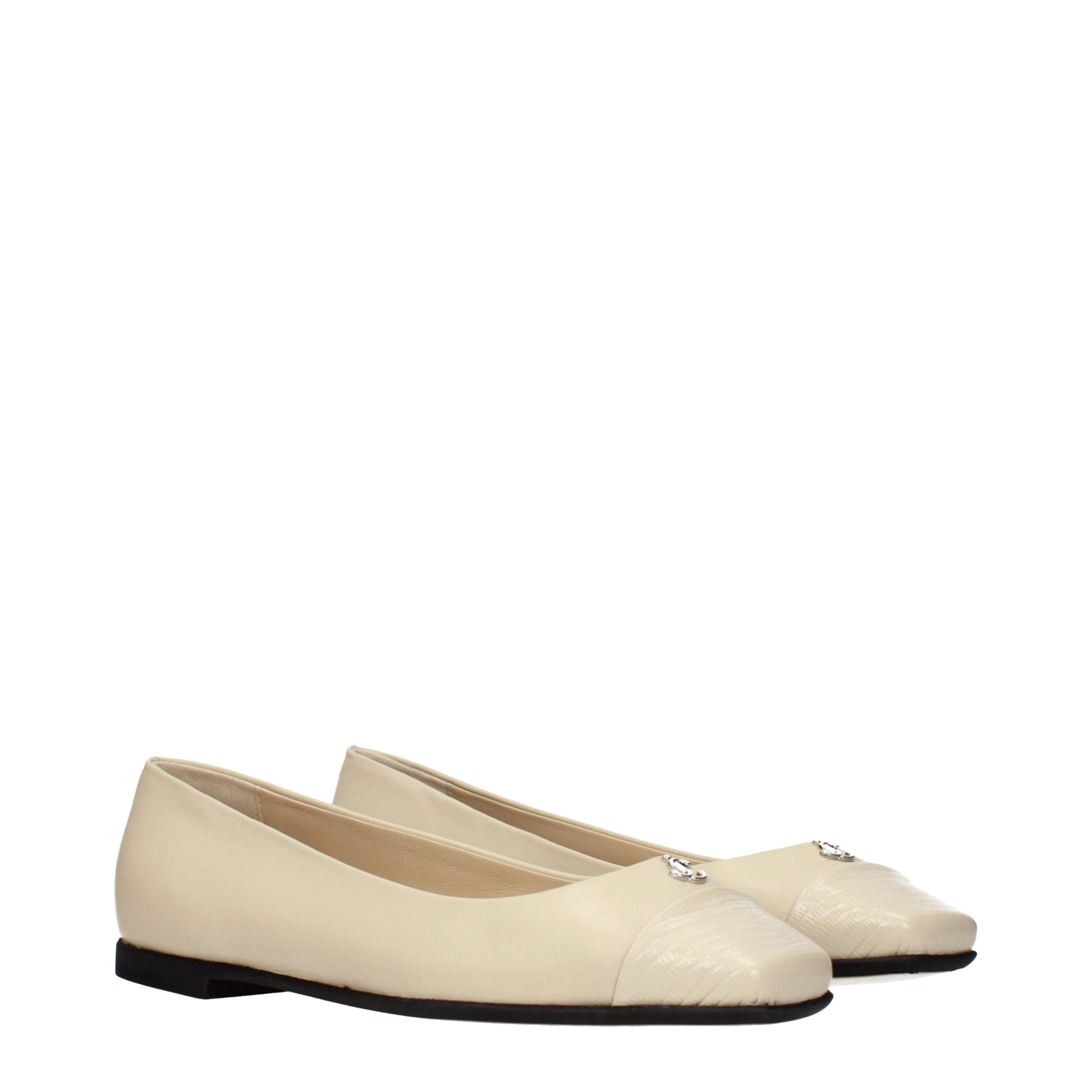 Indulge in the elegance of Jimmy Choo Beige Leather Ballet Flats, where exquisite craftsmanship meets timeless sophistication, perfect for the discerning connoisseur.