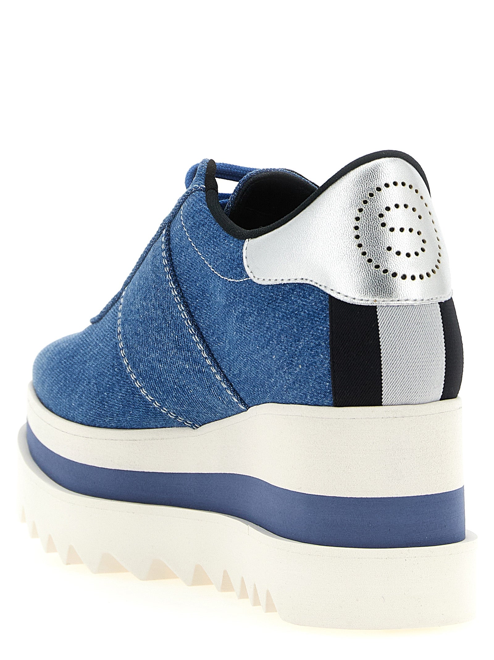 Elevate your style with Stella McCartney's Blue EVA Wedge Sandals, a perfect blend of modern design and conscious luxury, crafted for the discerning individual.