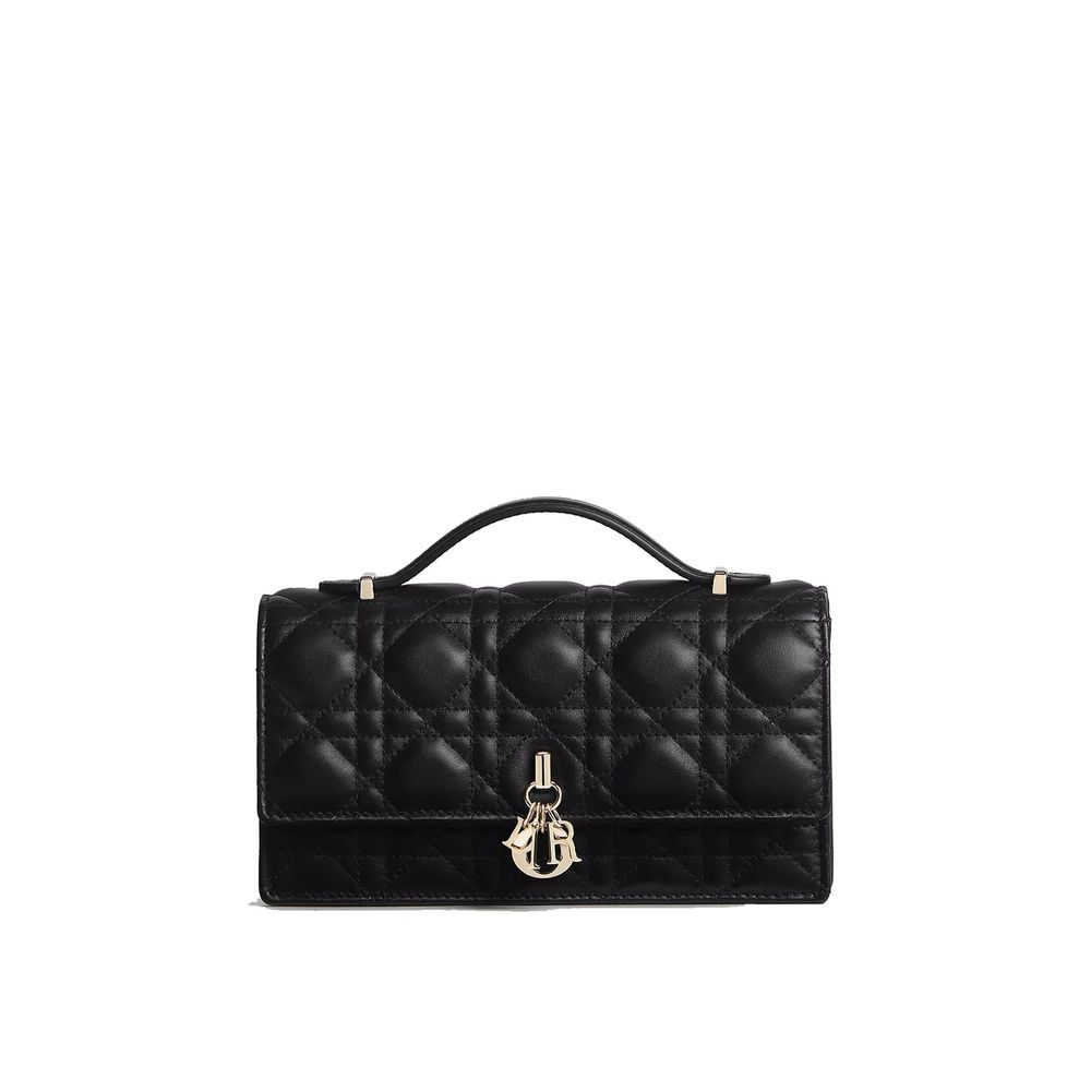 Indulge in the exquisite allure of the Dior Black Leather Shoulder Bag, crafted from luxurious quilted lambskin, a timeless accessory for the discerning individual.