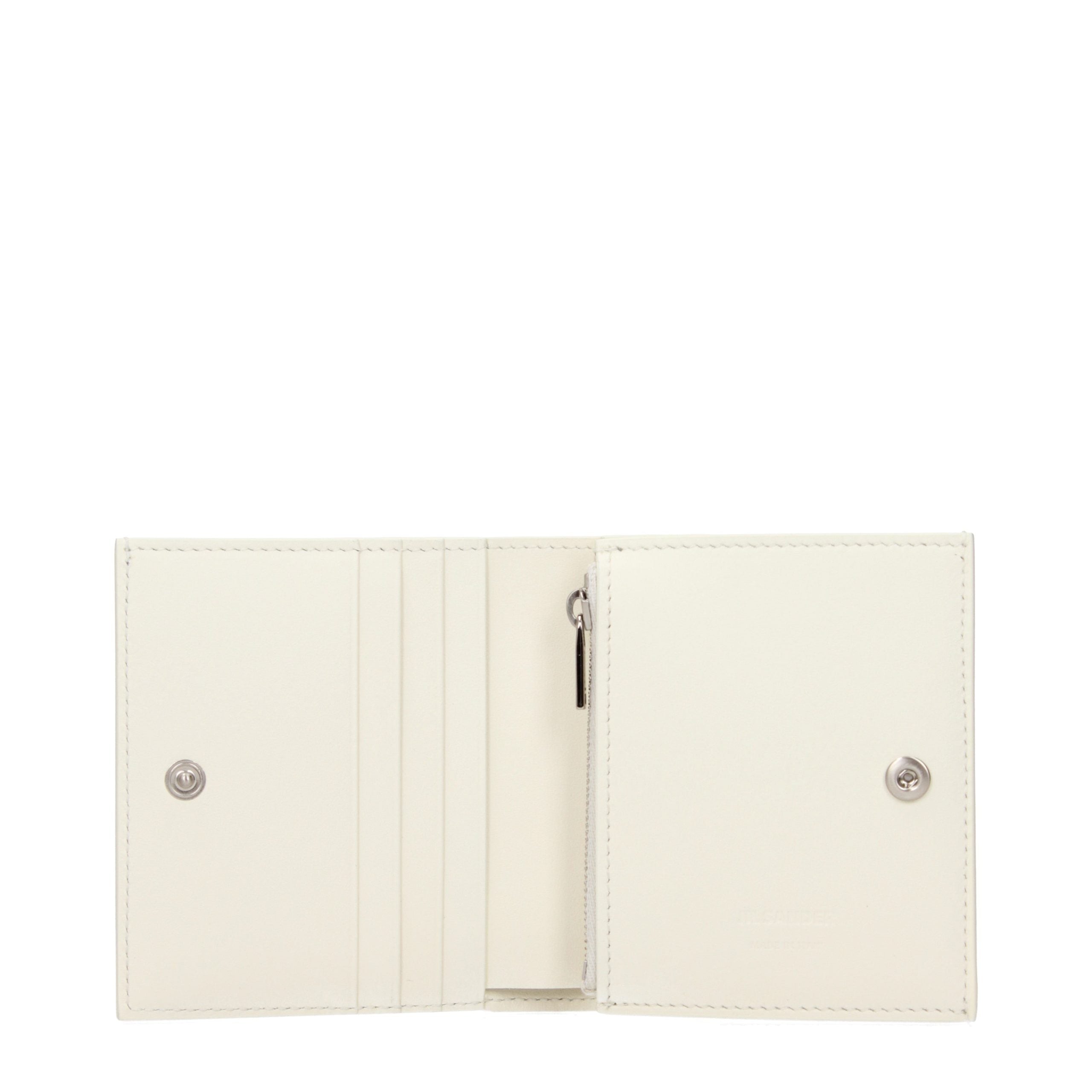 Discover the Jil Sander White Leather Wallet, a symbol of refined elegance, featuring a vintage effect and meticulous craftsmanship for the discerning individual.