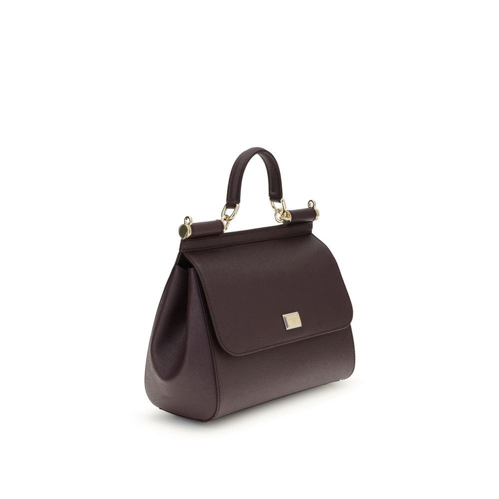 Indulge in the exquisite allure of the Dolce & Gabbana Bordeaux Calf Leather Bos Taurus Handbag, a timeless masterpiece that elevates your elegance and sophistication.