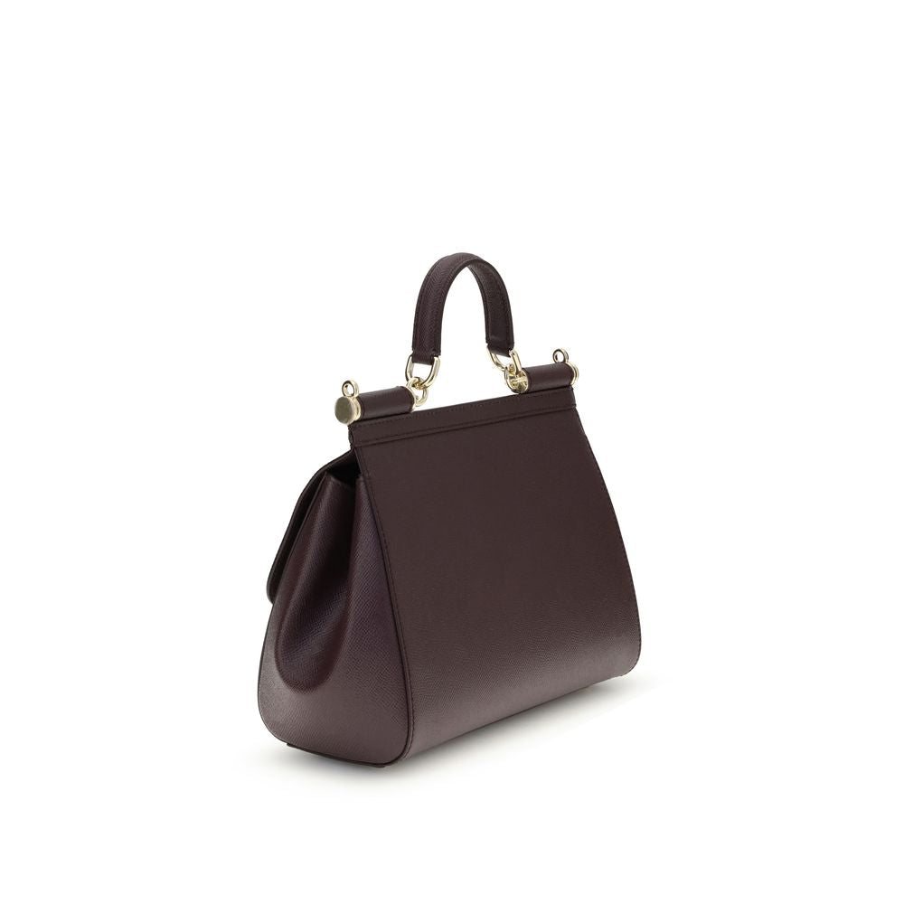 Indulge in the timeless elegance of the Dolce & Gabbana Bordeaux Calf Leather Bos Taurus Handbag, a masterpiece of sophistication crafted for the discerning individual.