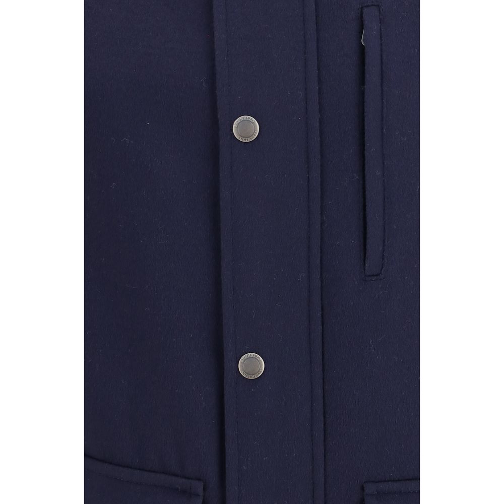 Indulge in the exquisite Brunello Cucinelli Blue Wool Oves Aries Full-Length Jacket, a masterpiece of virgin wool and nappa detailing, embodying timeless elegance and refined luxury.