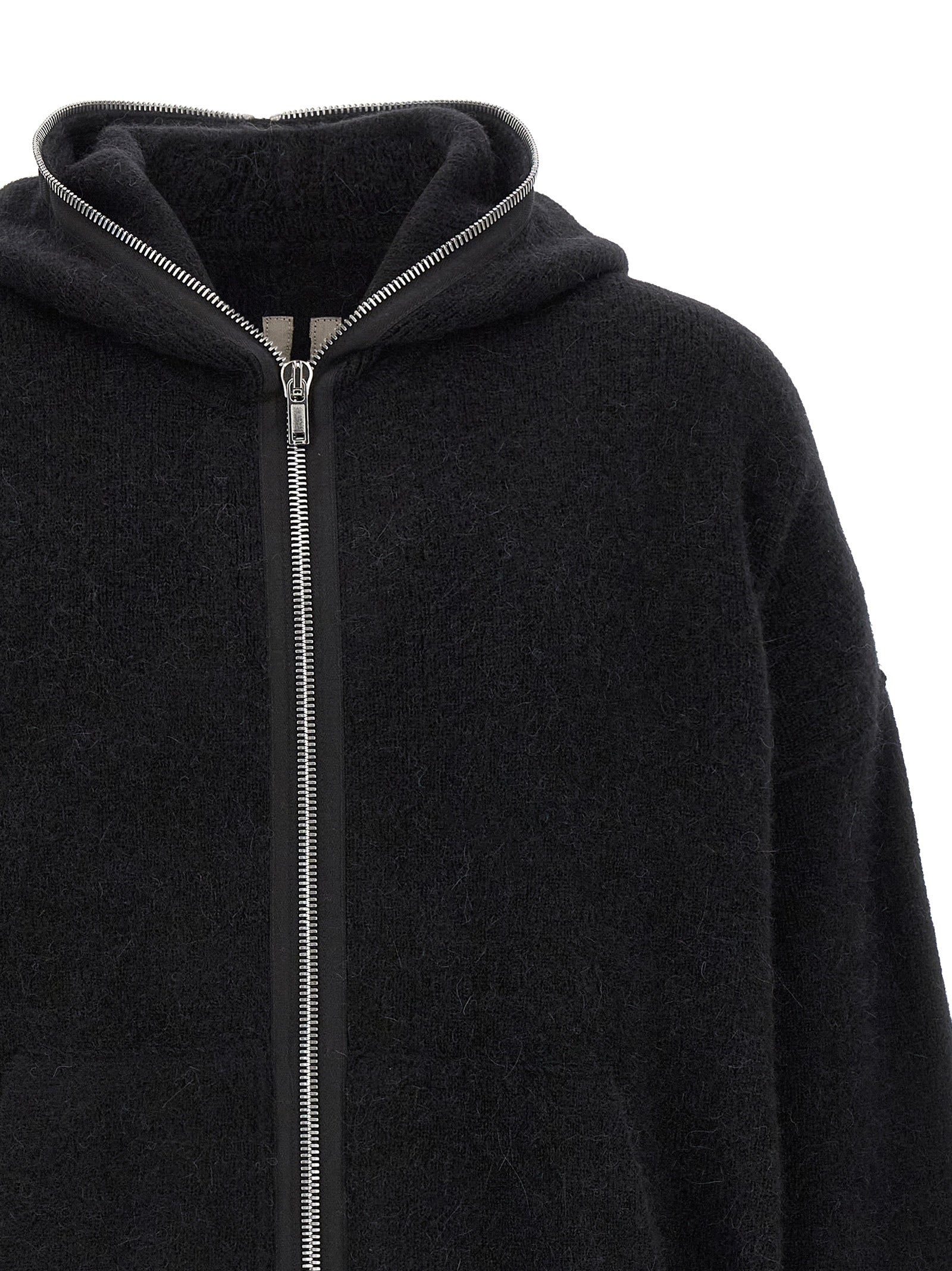 Indulge in the avant-garde elegance of the Rick Owens Black Marabou Sweatshirt, a luxurious blend of alpaca and wool that redefines modern artistry and sophistication.