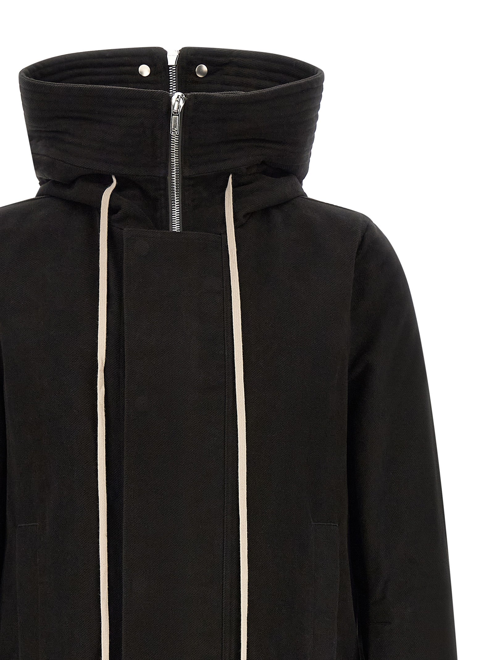 Discover the Rick Owens Black Cotton Parka, a masterpiece of structured elegance, blending avant-garde design with luxurious craftsmanship for the discerning individual.