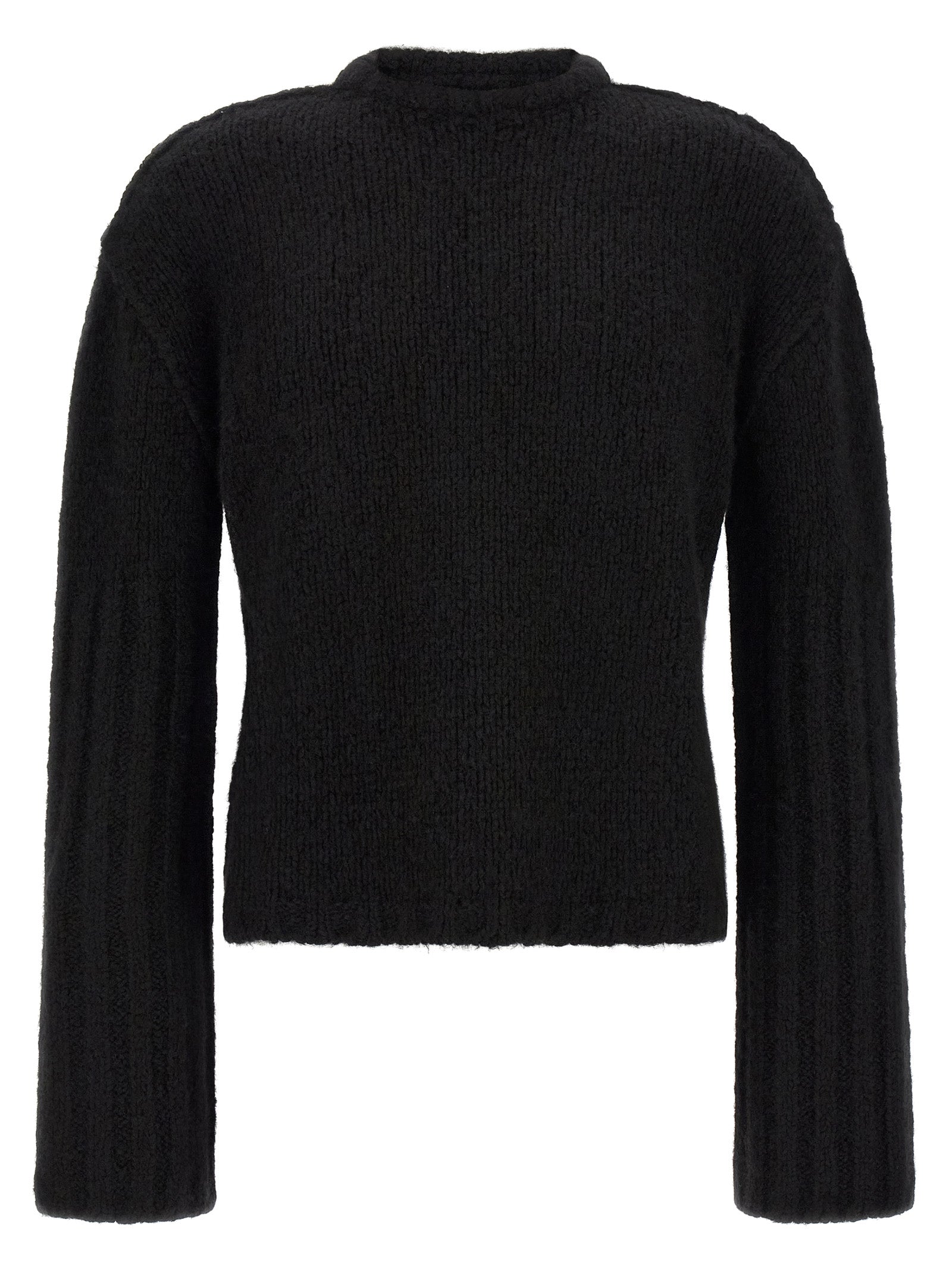 Indulge in the exquisite Rick Owens Black Cashmere Cardigan, where luxurious cashmere and silk meet avant-garde design, embodying timeless elegance for the discerning wardrobe.