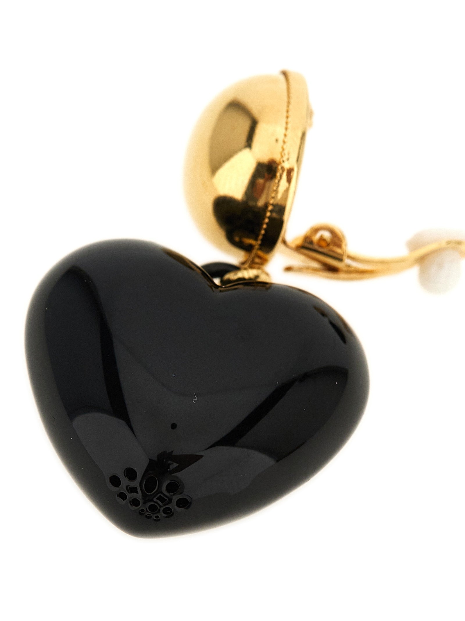 Elevate your elegance with Dolce & Gabbana Black Brass Earrings, a statement of timeless sophistication and sculptural allure, crafted in Italy for the discerning connoisseur.