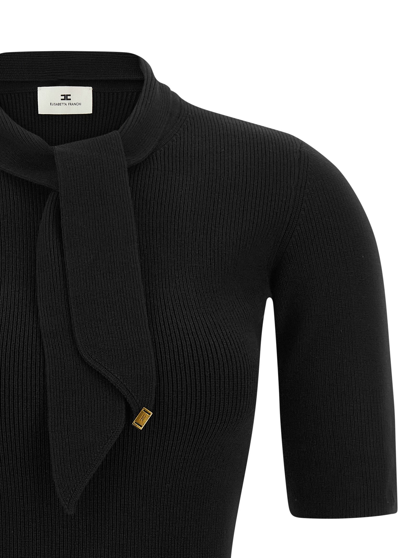 Experience the allure of the Elisabetta Franchi Black Viscose Short Dress, a masterpiece of elegance and sophistication, crafted to enhance your silhouette with timeless charm.