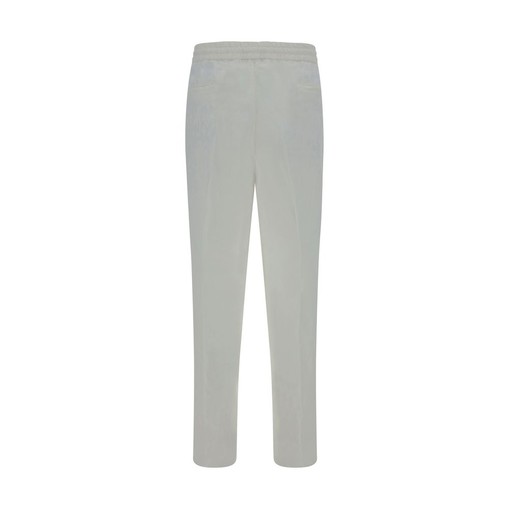 Discover the elegance of Brunello Cucinelli's White Linen Casual Pants, crafted from 100% linen for effortless sophistication and timeless style.