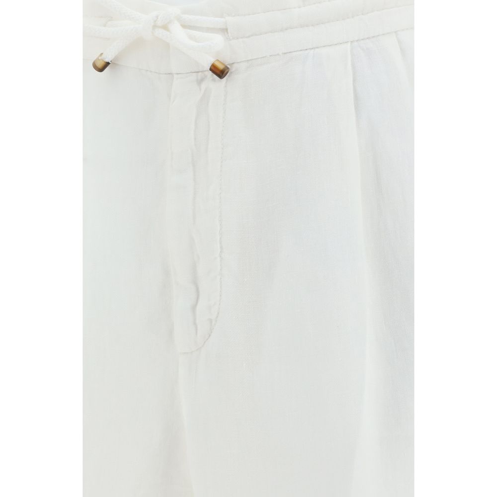 Indulge in the exquisite elegance of Brunello Cucinelli's White Linen Casual Pants, crafted from 100% linen for ultimate comfort and sophistication.