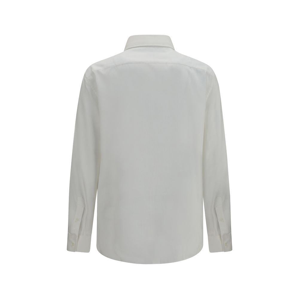 Elevate your wardrobe with the Brunello Cucinelli White Cotton Dress Shirt, a masterpiece of elegance and versatility, crafted for the discerning individual.